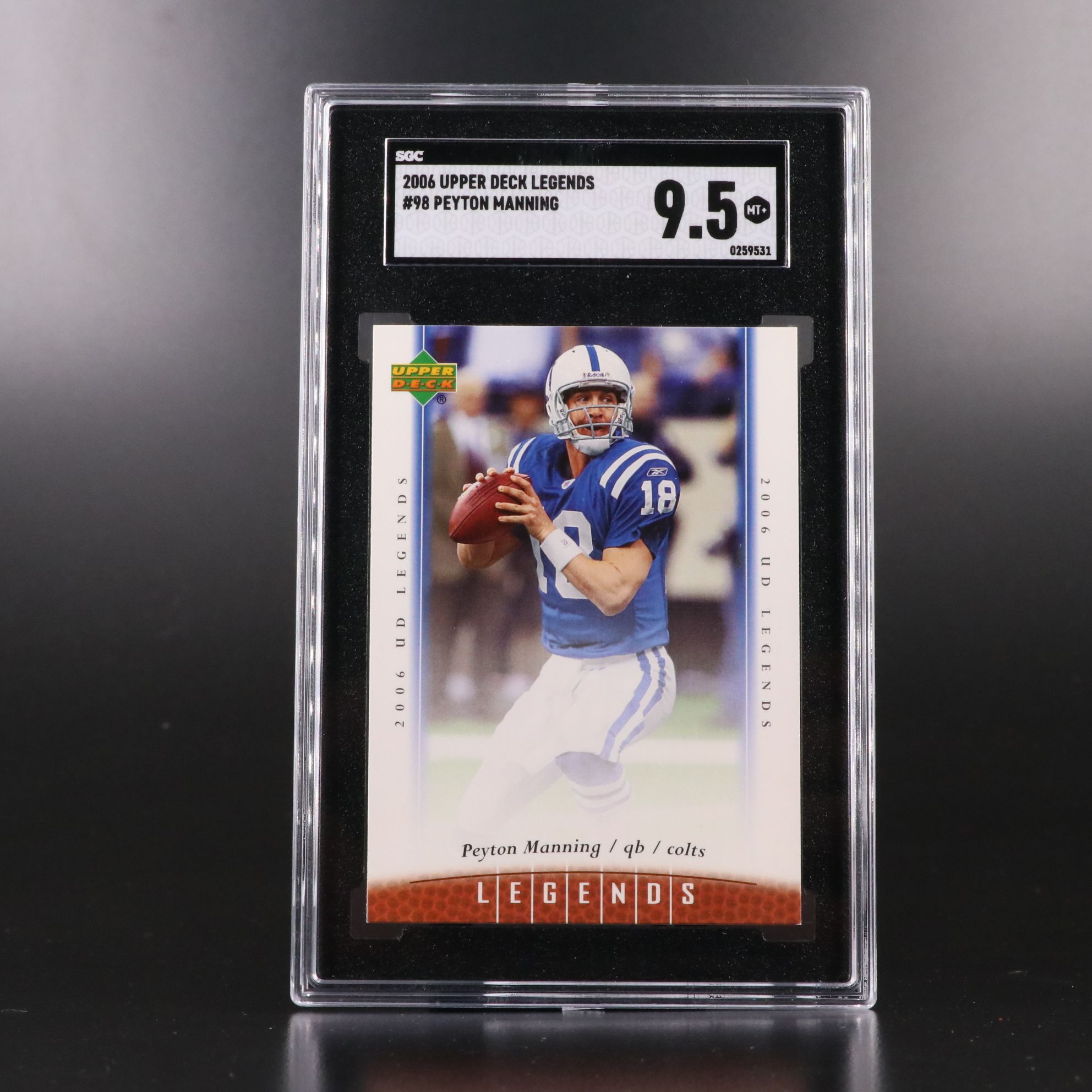 Peyton, Archie, Eli, and Arch Manning SGC Graded Football Cards