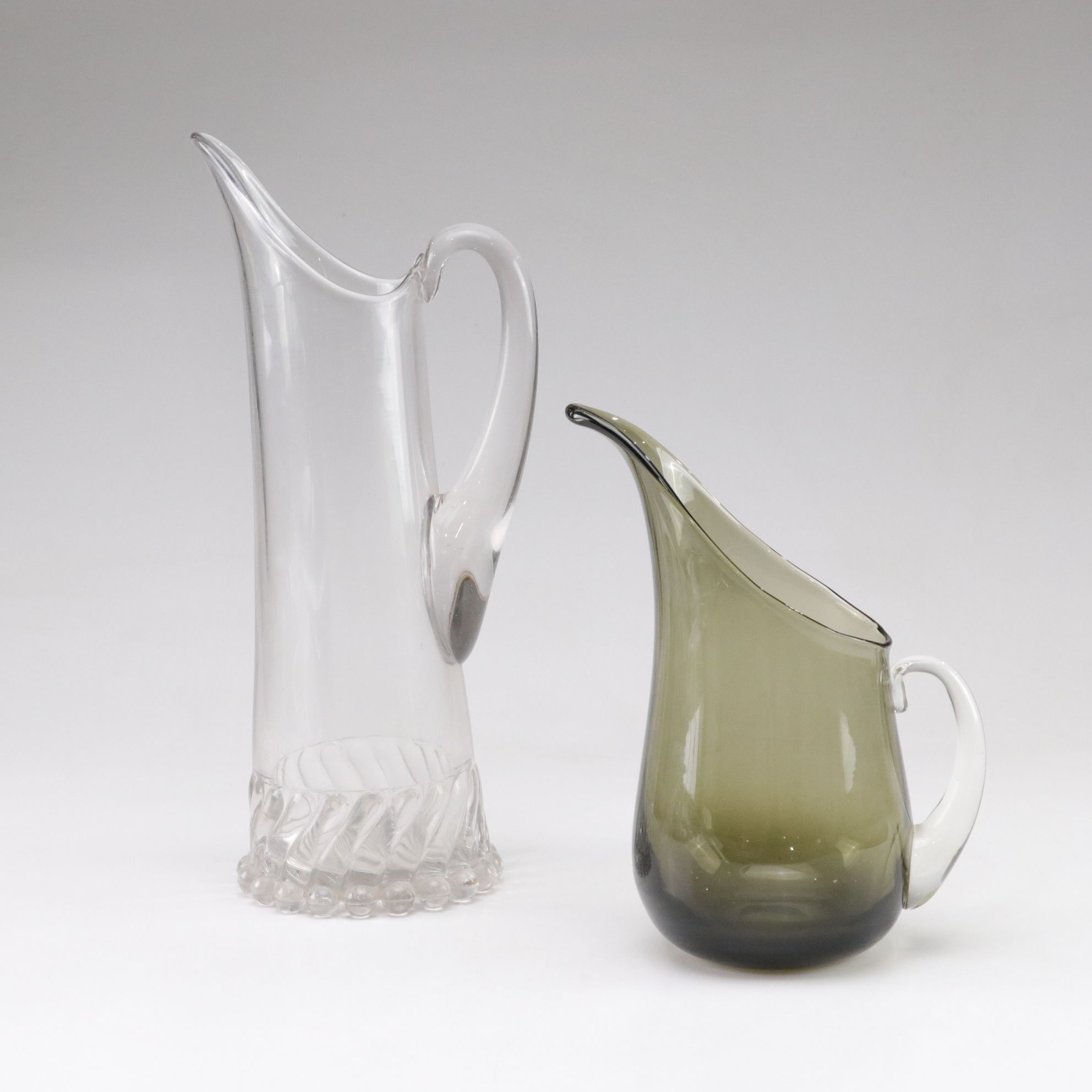 Pair of Blown Glass Pitchers
