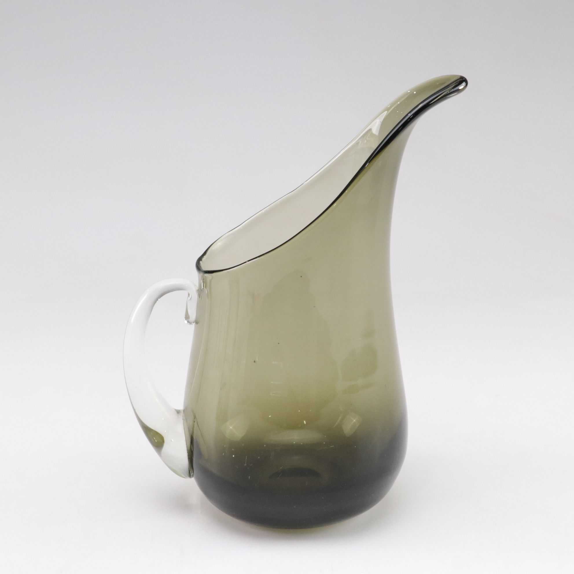 Pair of Blown Glass Pitchers