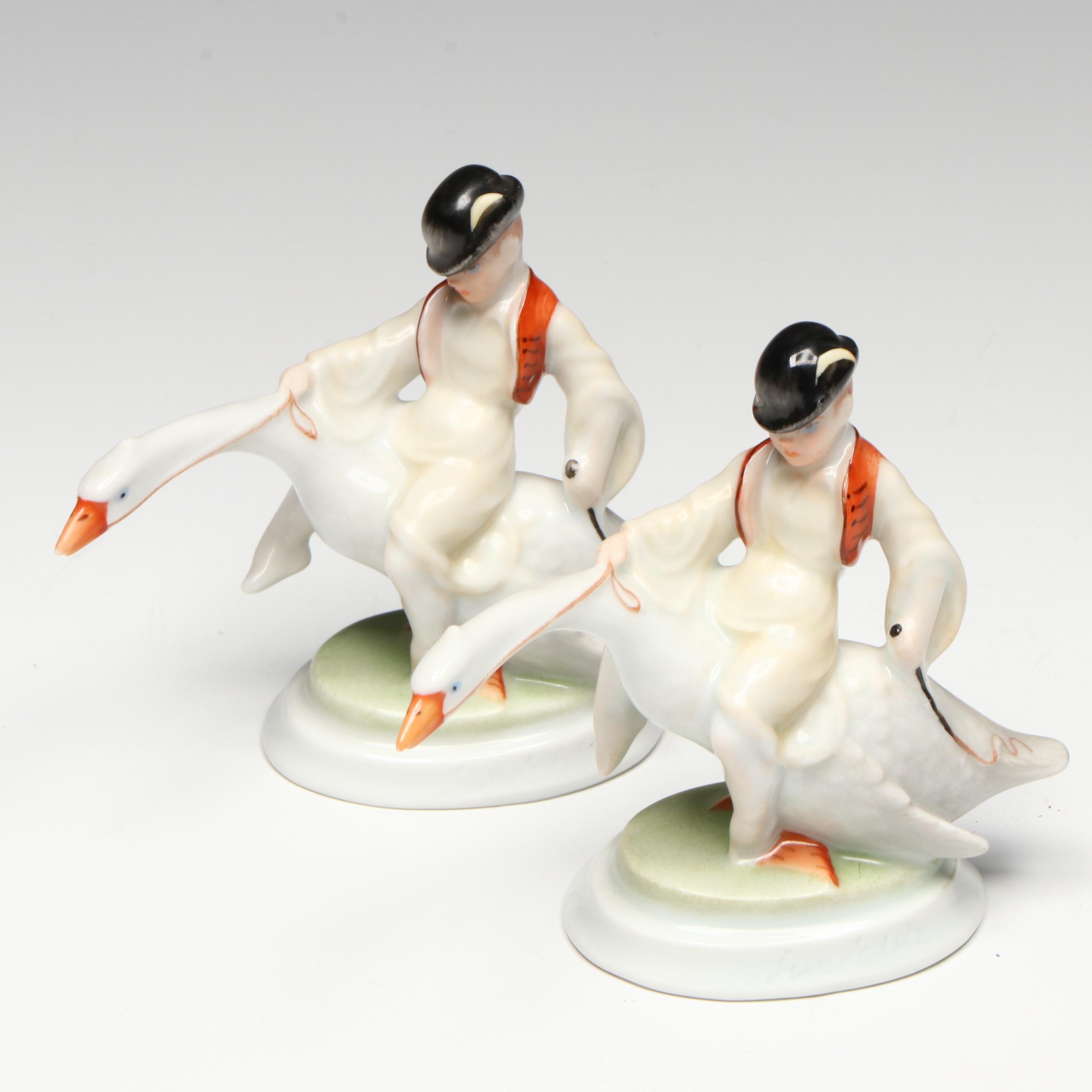 Pair of Herend "Boy Riding Goose" Porcelain Figurines