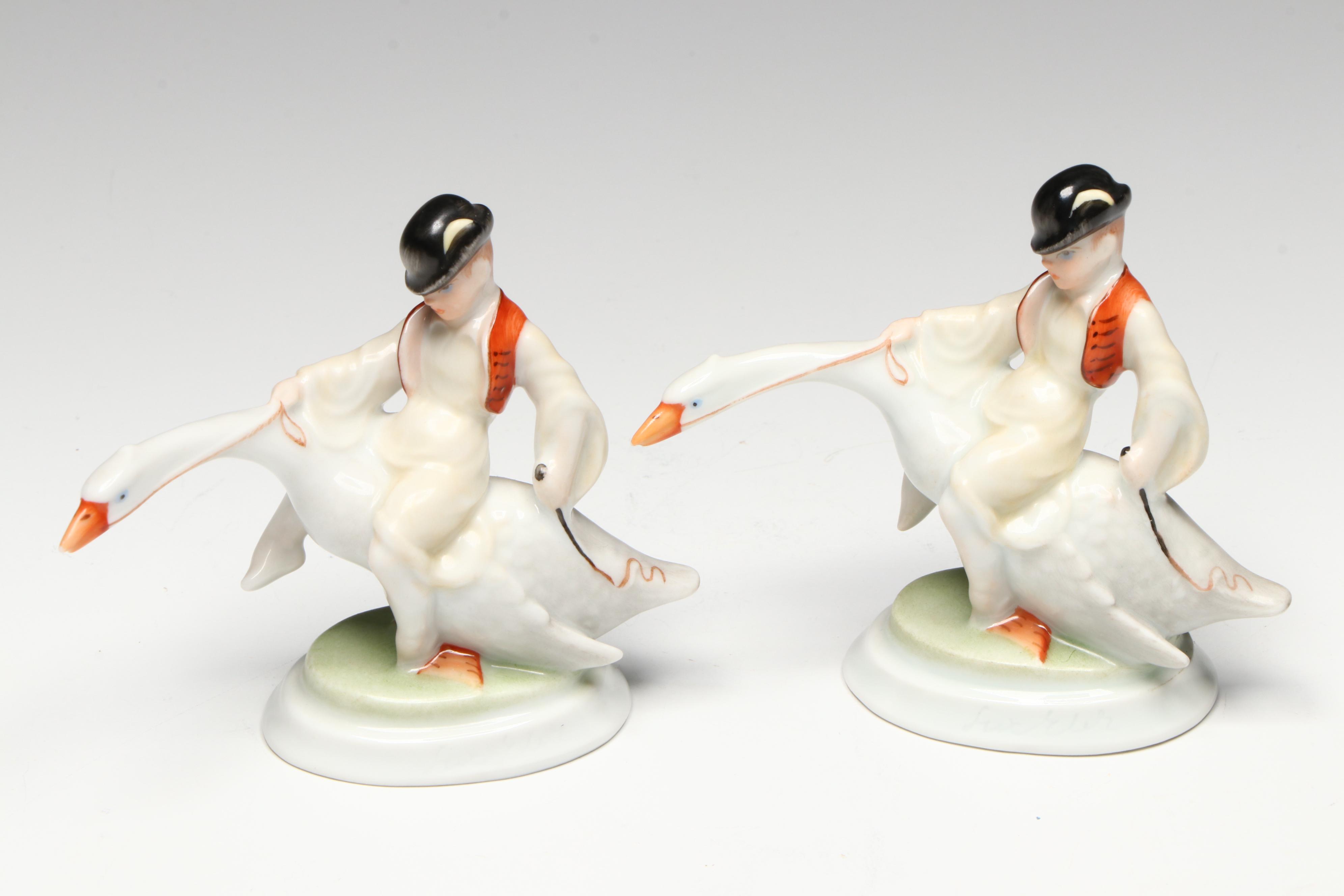 Pair of Herend "Boy Riding Goose" Porcelain Figurines