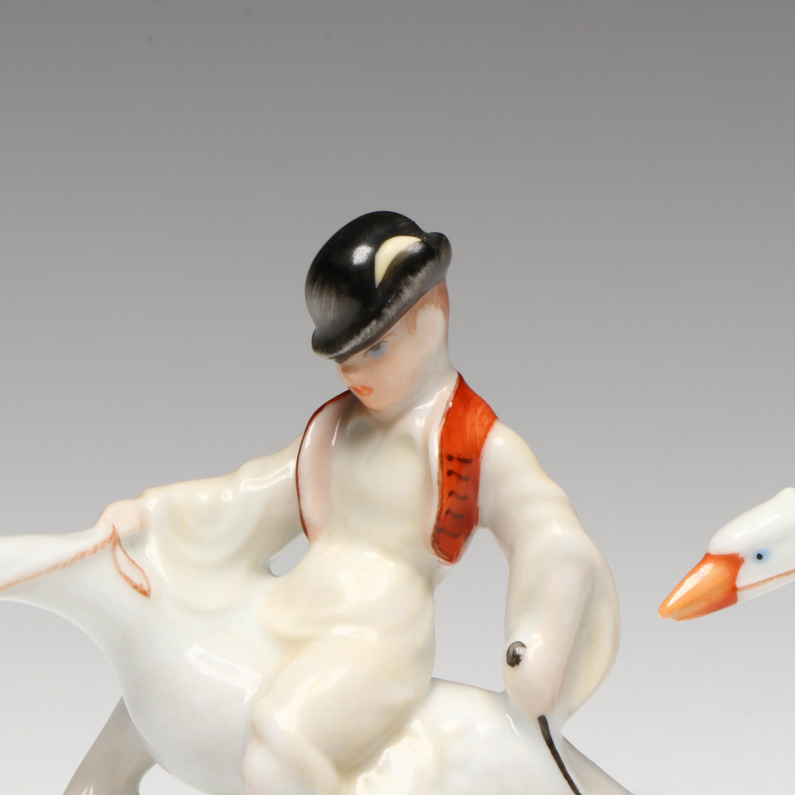 Pair of Herend "Boy Riding Goose" Porcelain Figurines