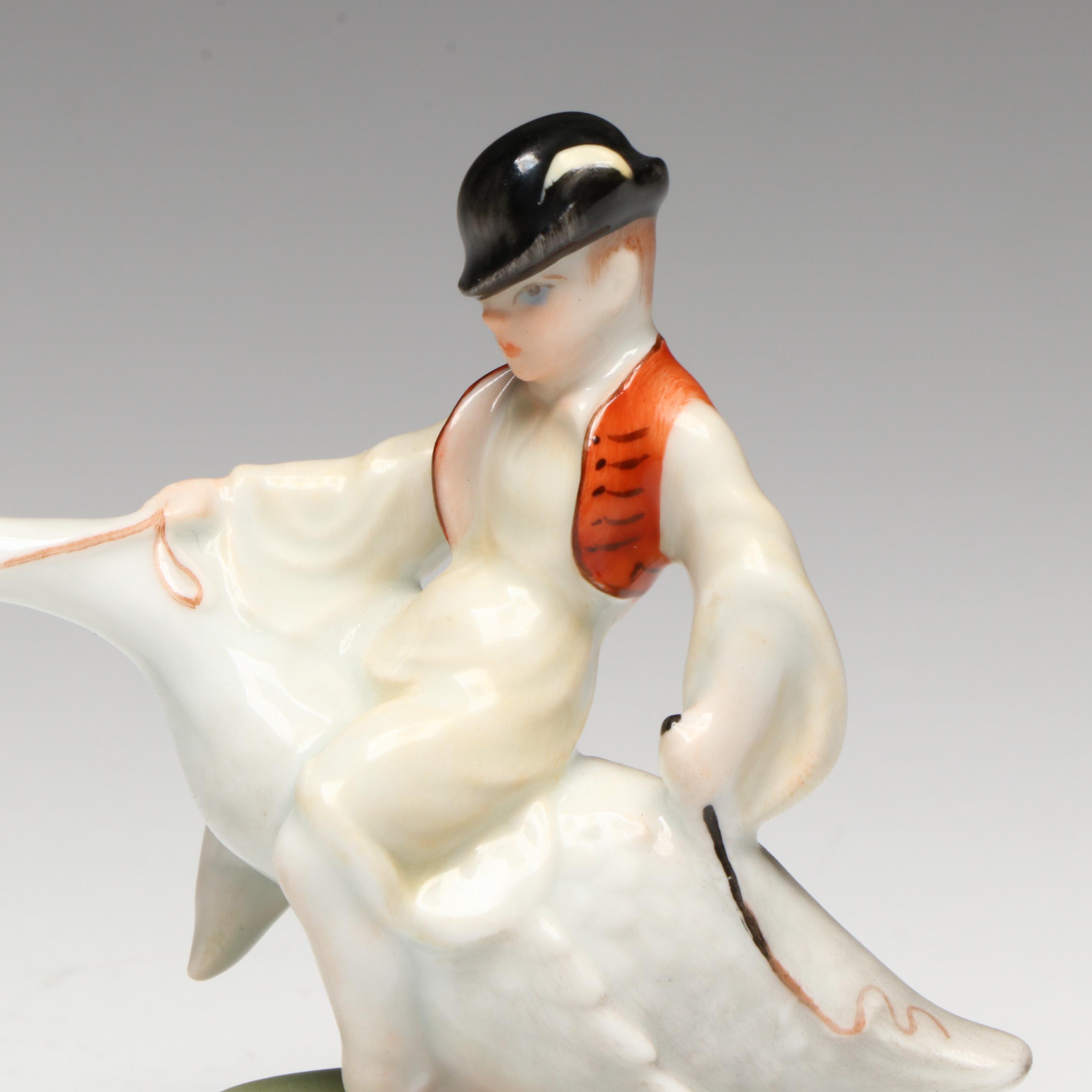 Pair of Herend "Boy Riding Goose" Porcelain Figurines