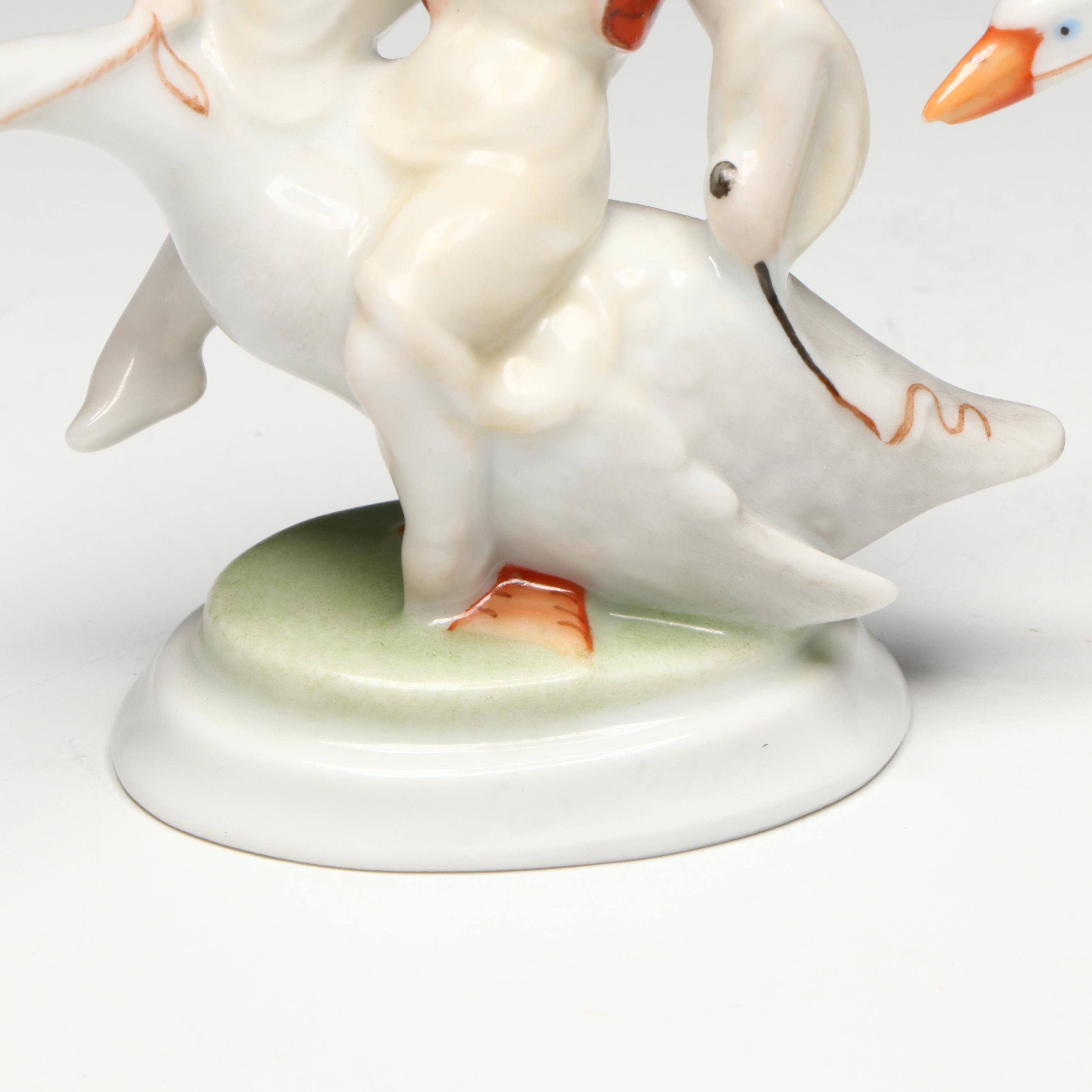 Pair of Herend "Boy Riding Goose" Porcelain Figurines