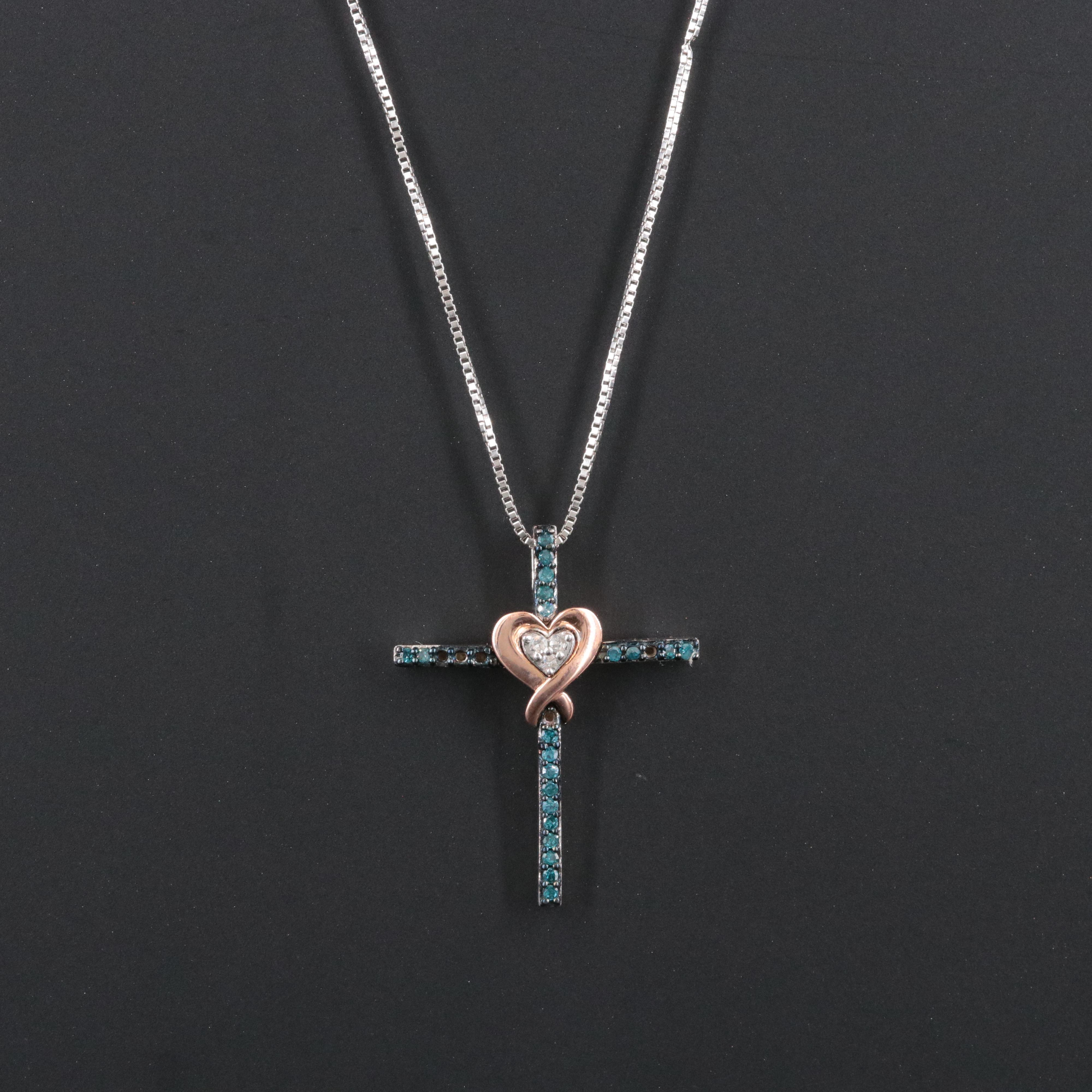 Sterling Diamond Cross with Heart Pendant Necklace Featuring Fancy Blue