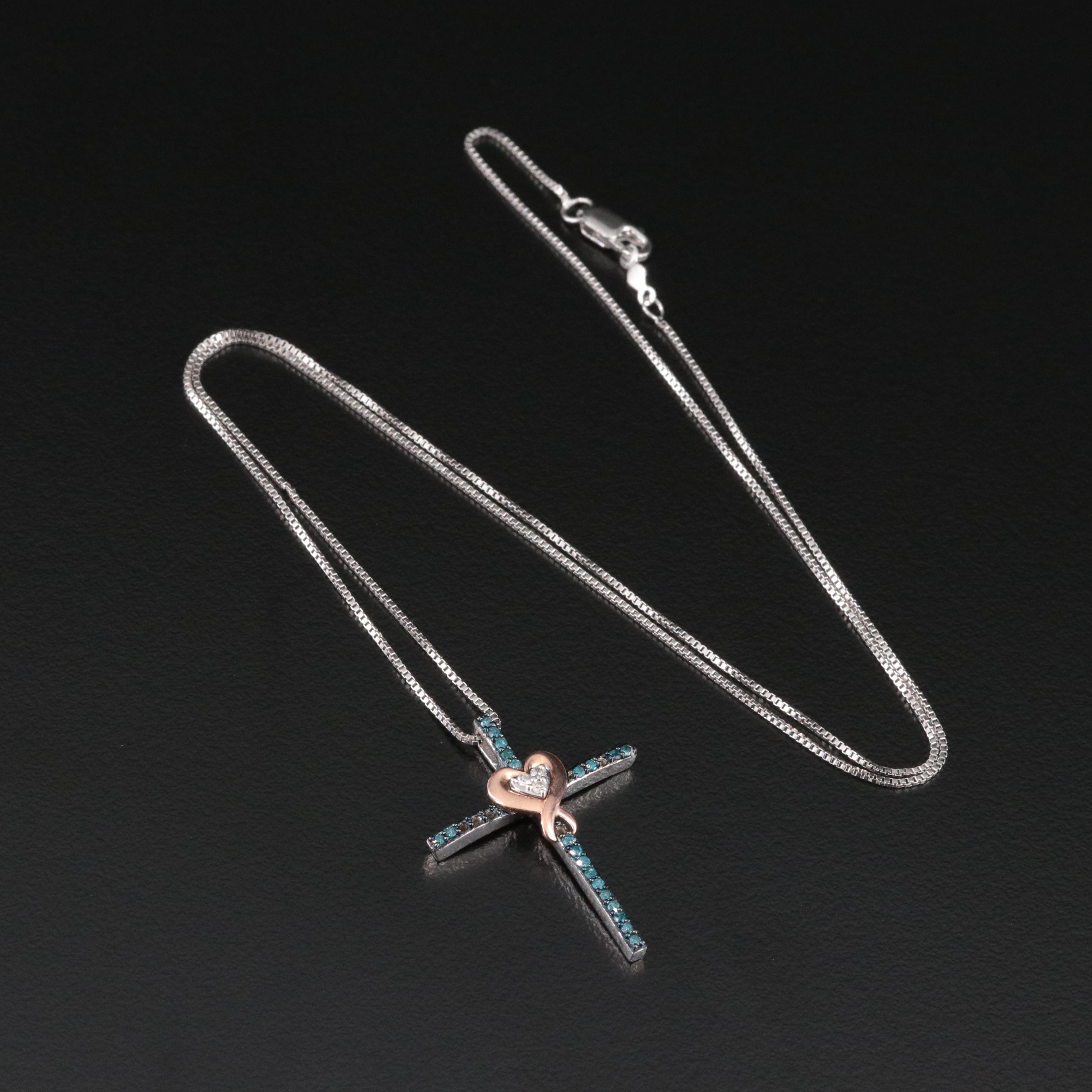 Sterling Diamond Cross with Heart Pendant Necklace Featuring Fancy Blue