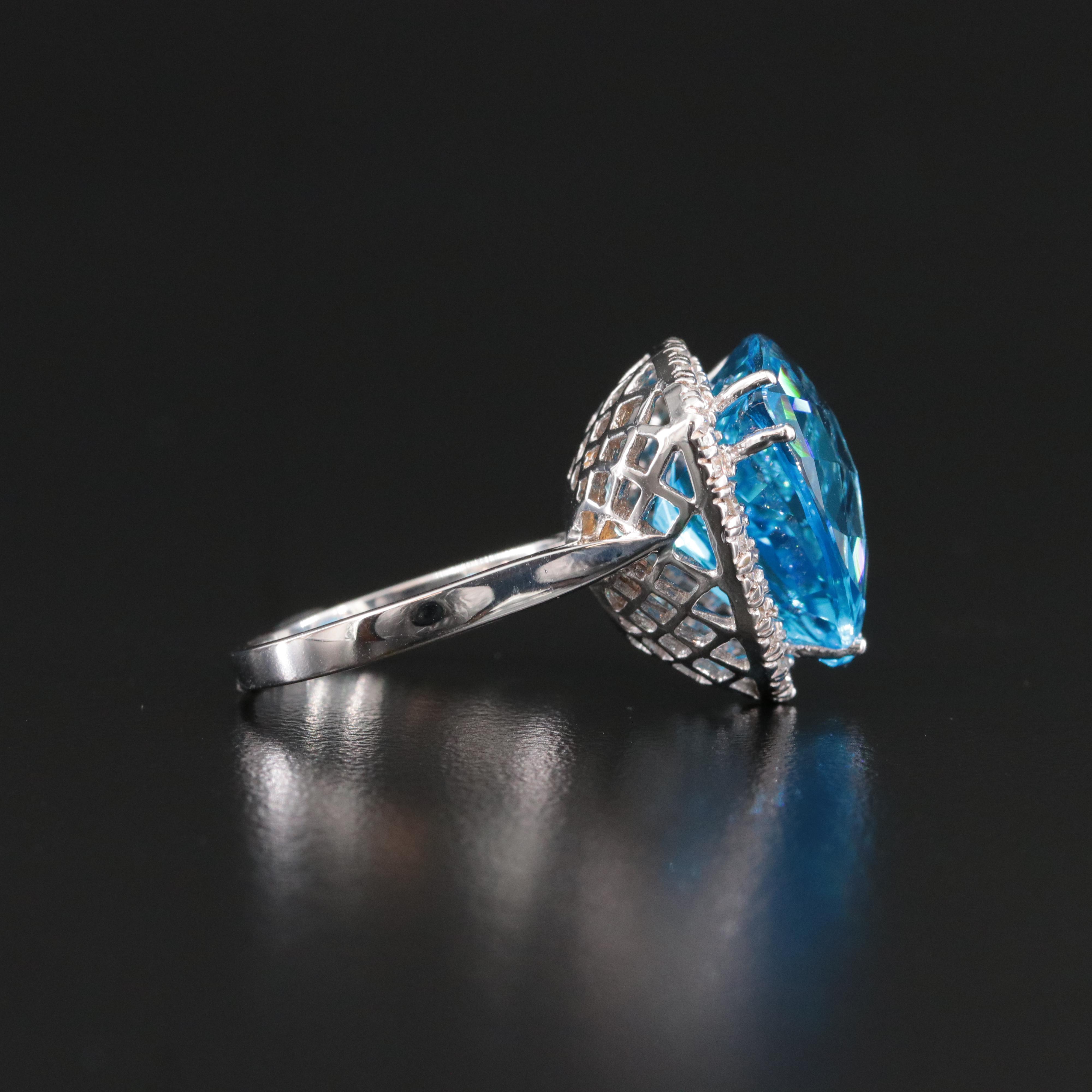 14K 16.60 CT Swiss Blue Topaz and Diamond Ring