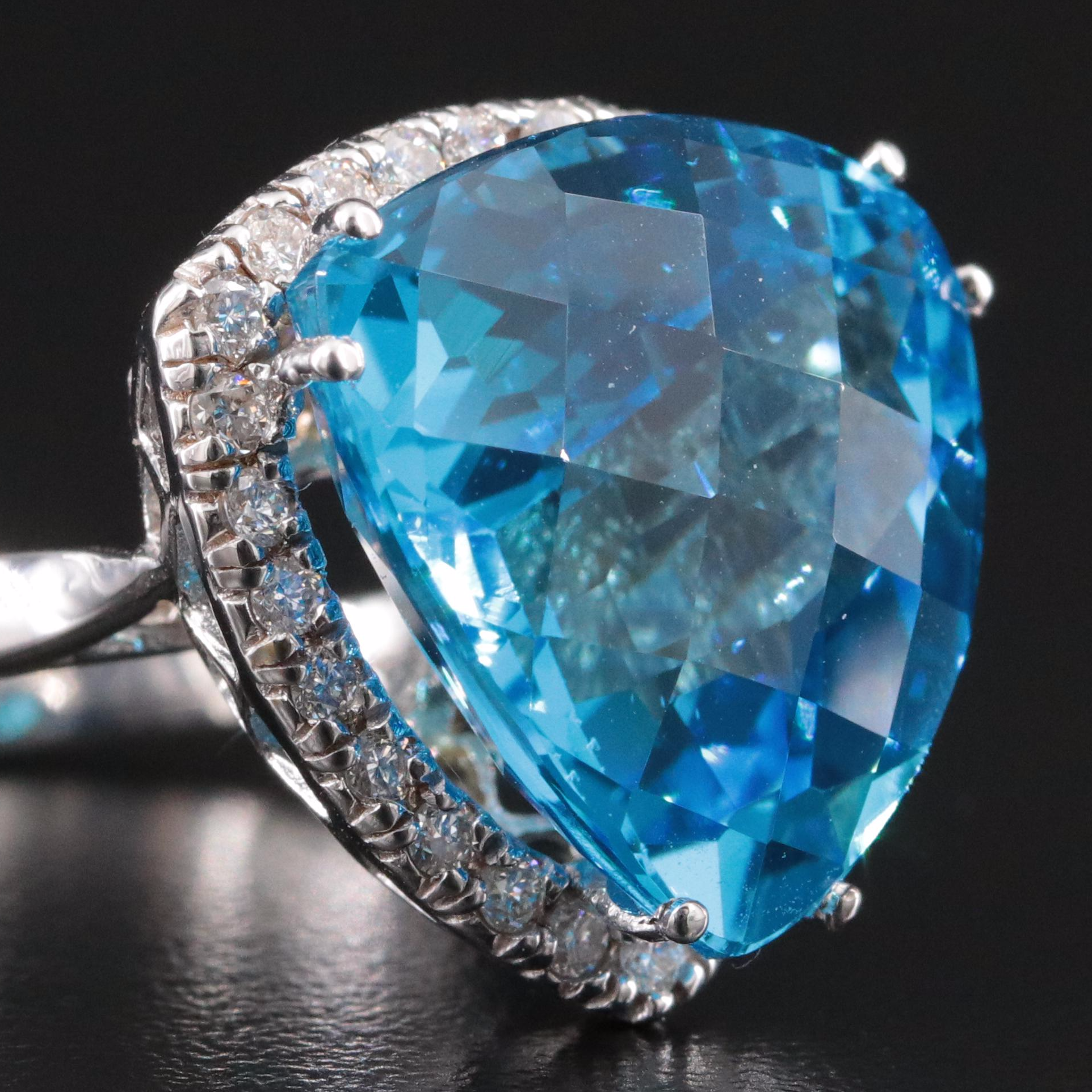 14K 16.60 CT Swiss Blue Topaz and Diamond Ring