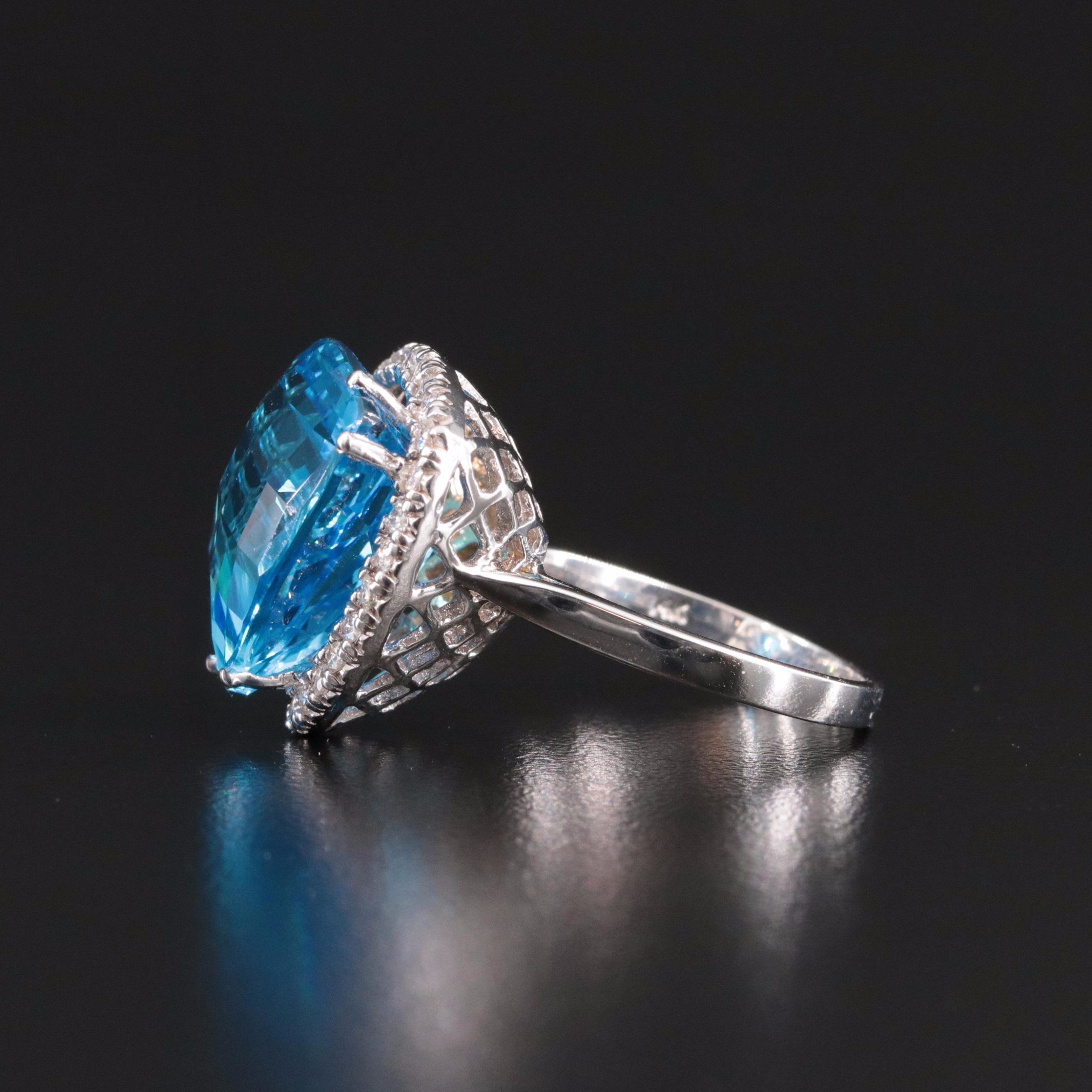 14K 16.60 CT Swiss Blue Topaz and Diamond Ring