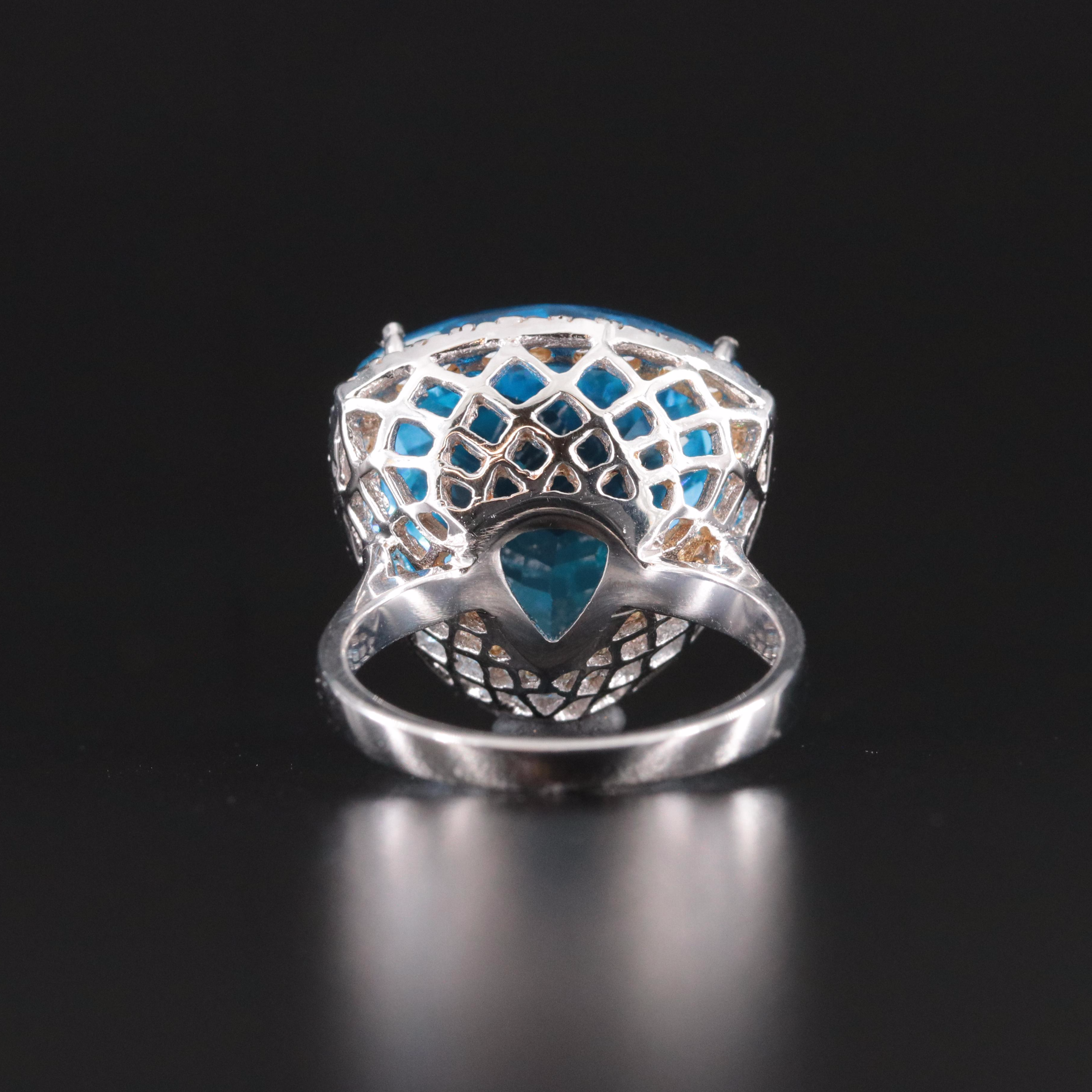 14K 16.60 CT Swiss Blue Topaz and Diamond Ring
