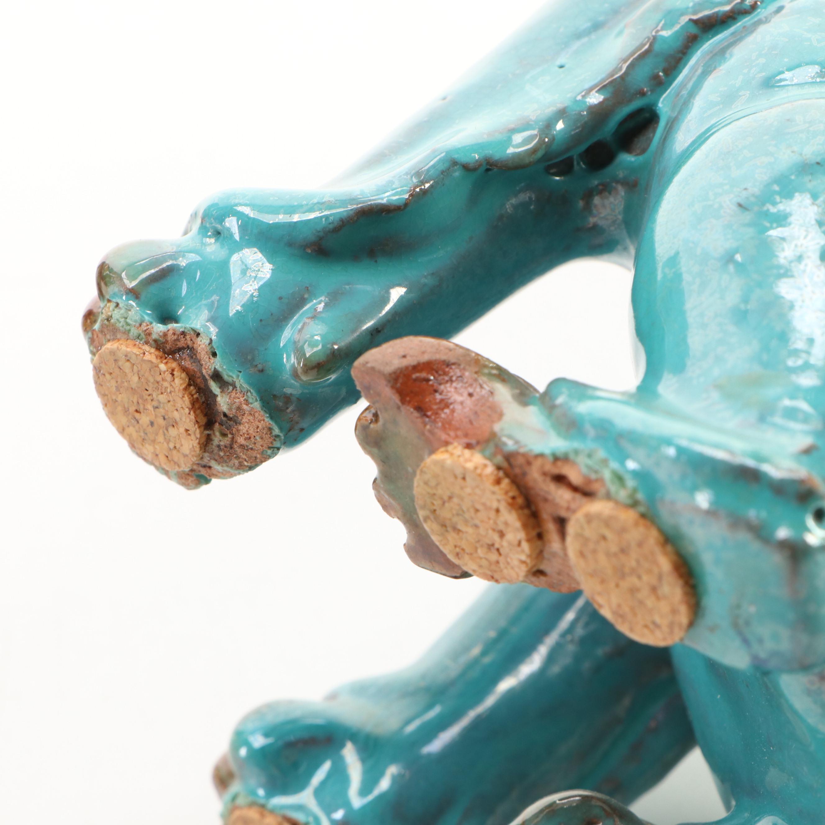 Pair of Chinese Drip Glazed Terracotta Guardian Lion Figures