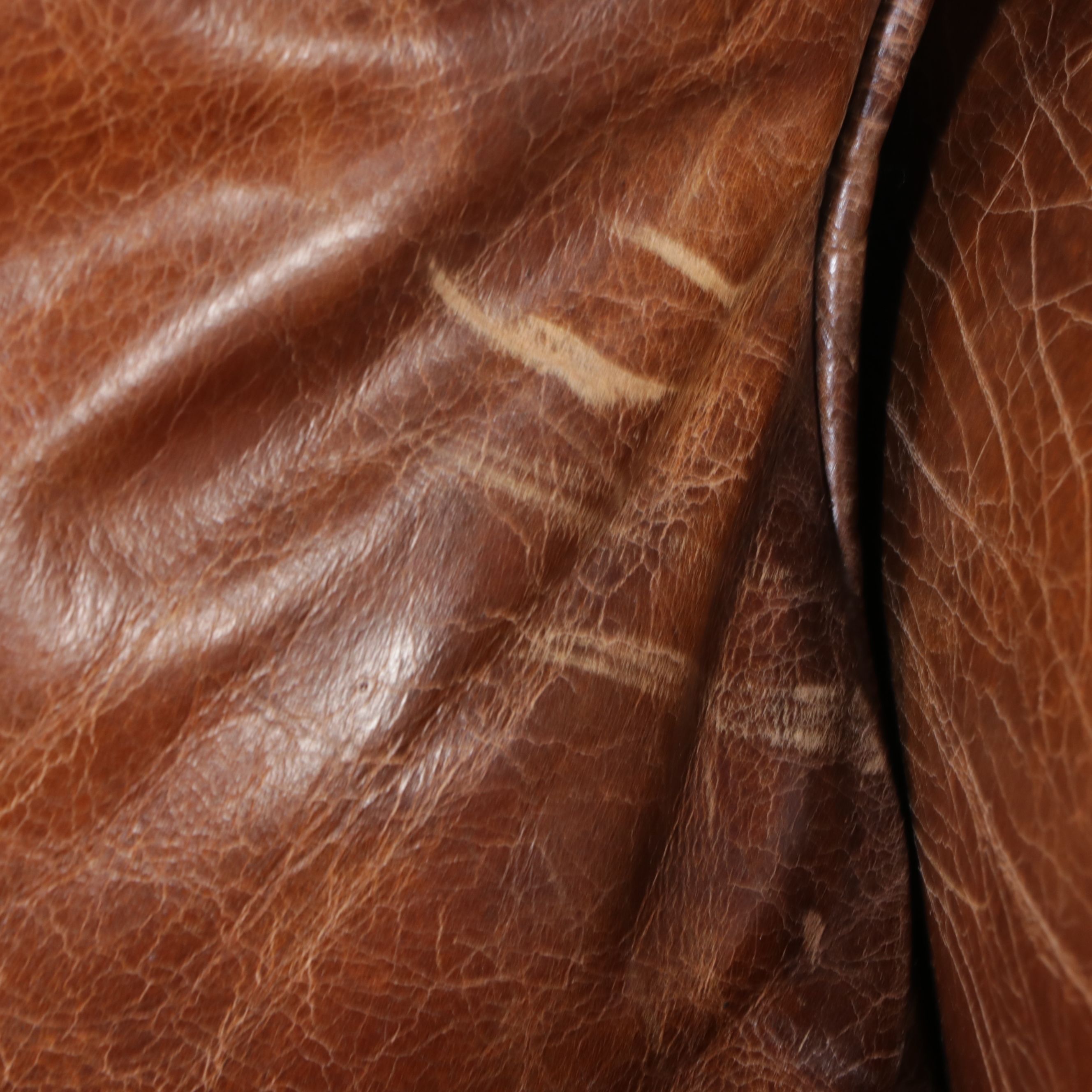Brown Leather Loveseat