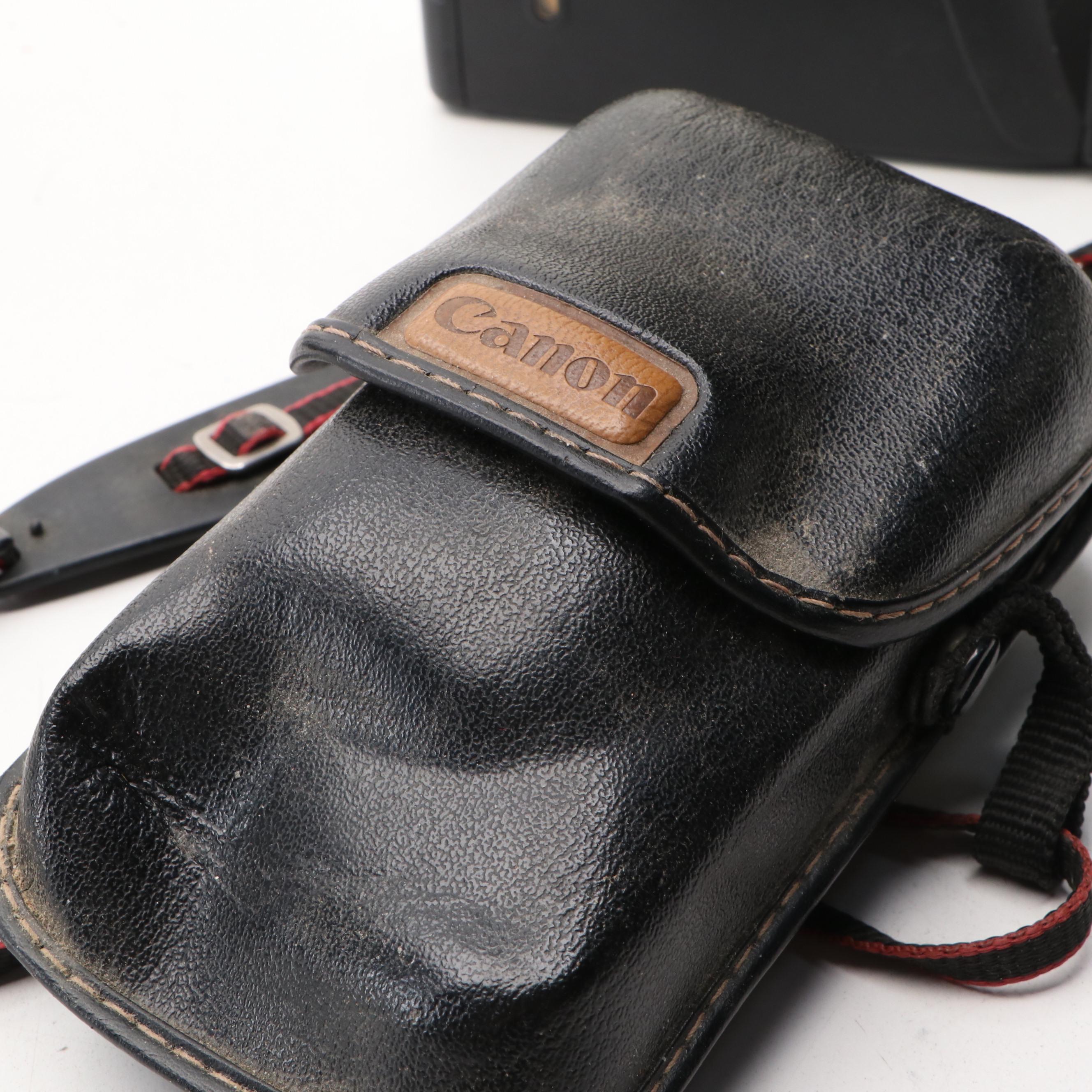 Canon EOS Elan II and Sure Shot Supreme Digital Cameras