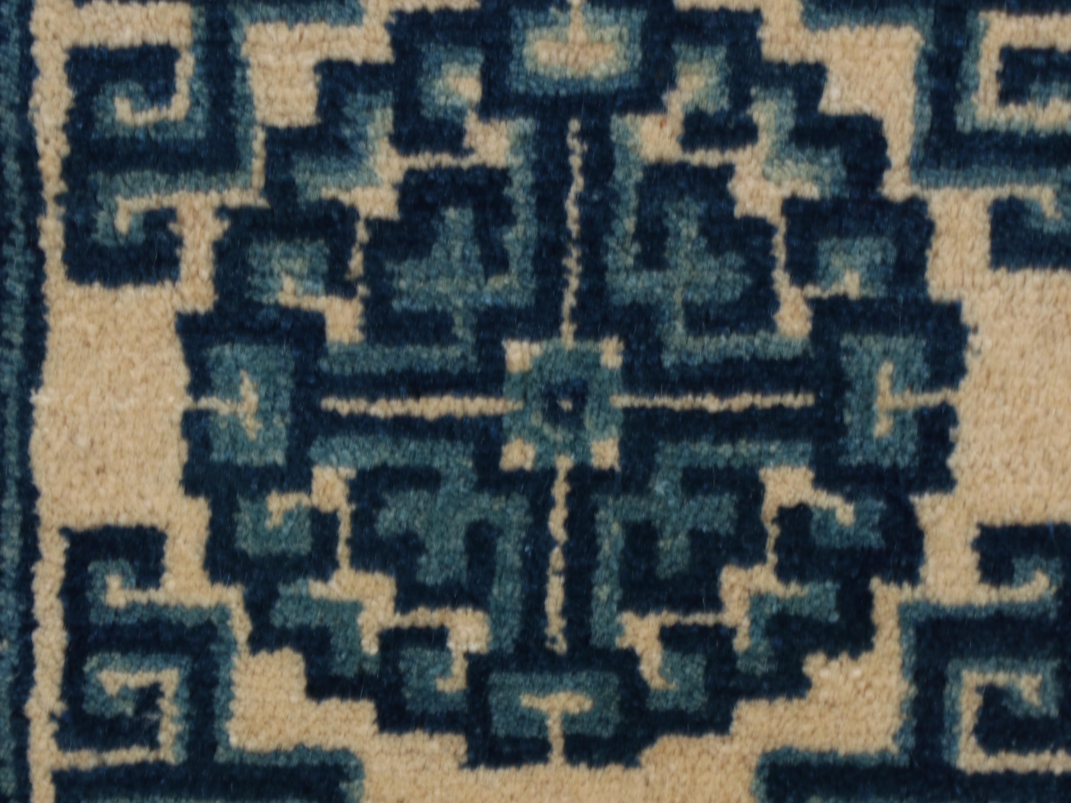 Chinese Blue and White Wool Knotted Rug in Wood Frame