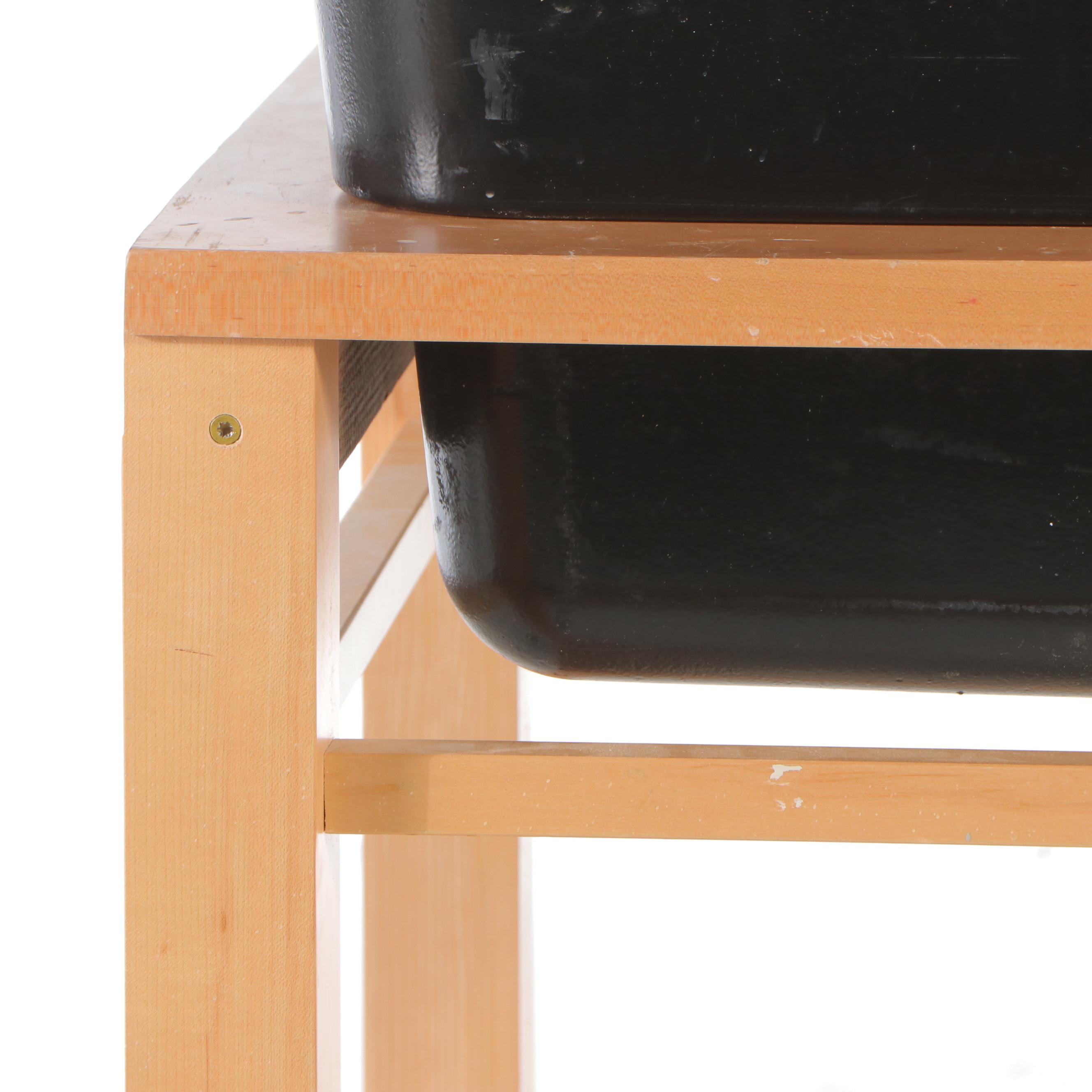 White Enameled Cast Iron Utility Sink in Wood Frame