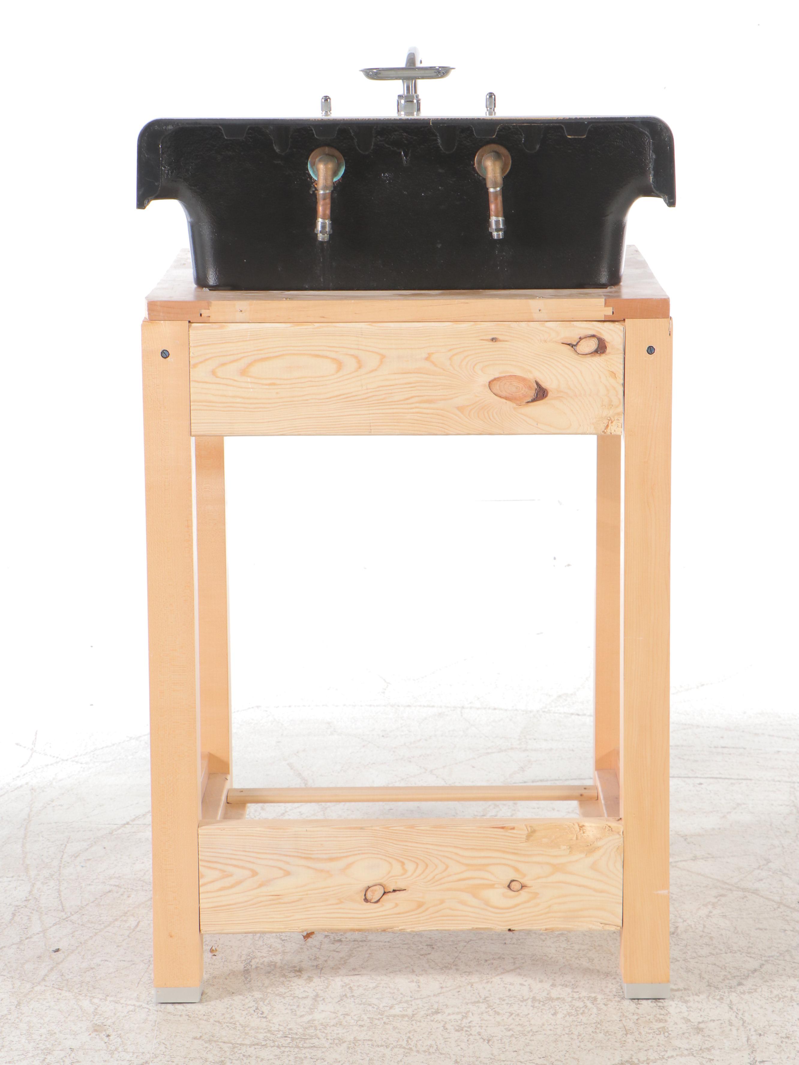 White Enameled Cast Iron Utility Sink in Wood Frame