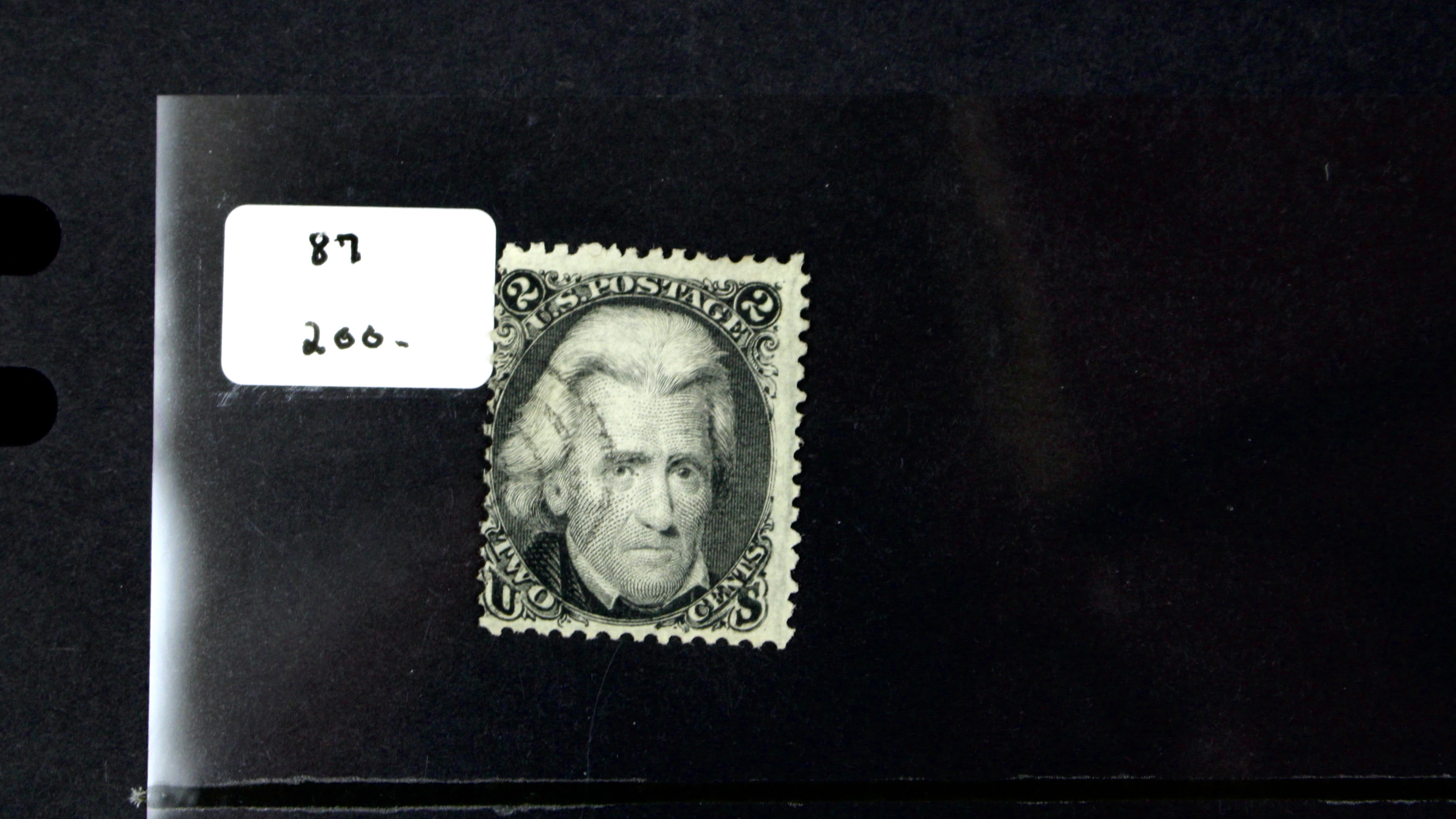 Seven Early U.S. Postage Stamps, All with Grills