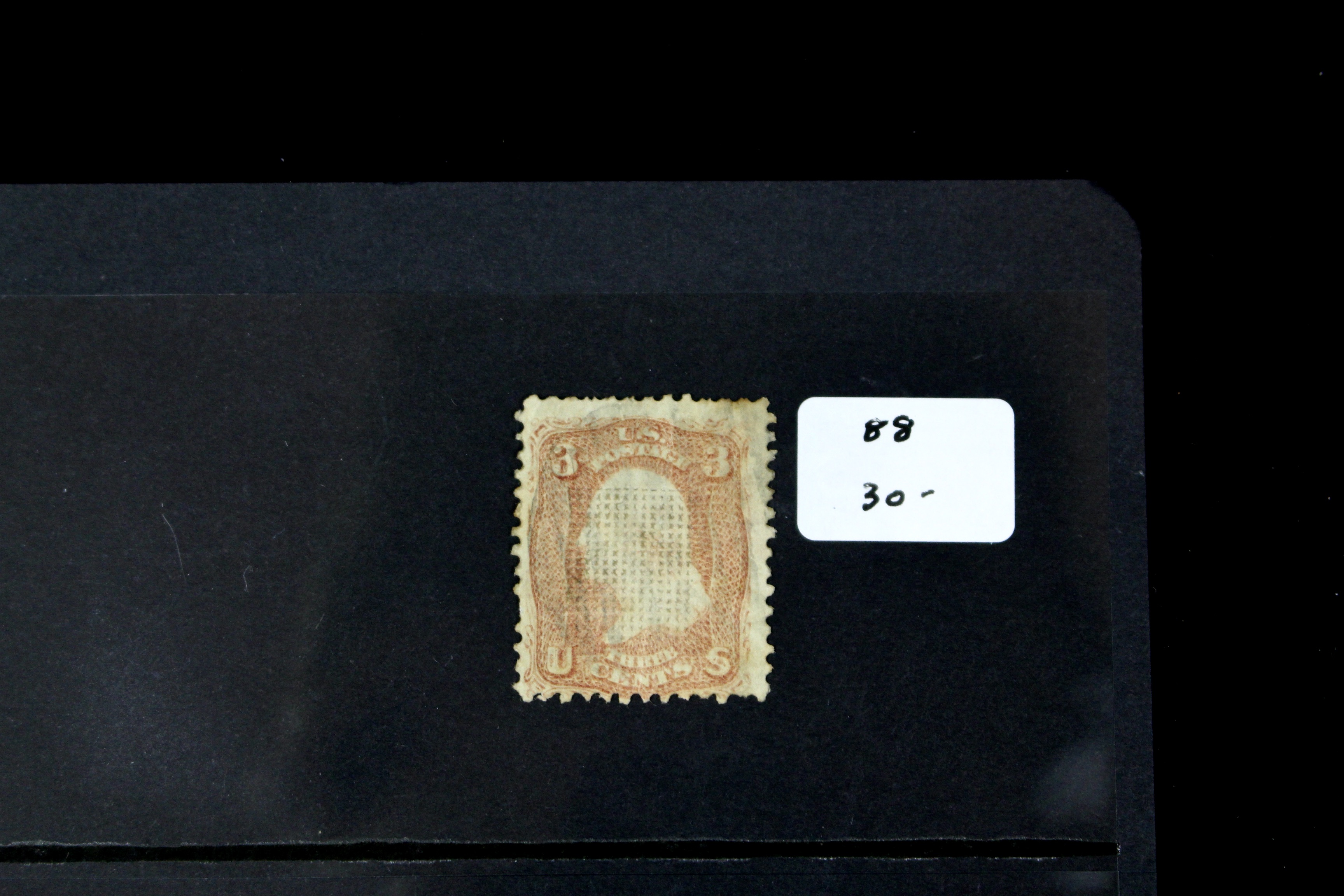 Seven Early U.S. Postage Stamps, All with Grills