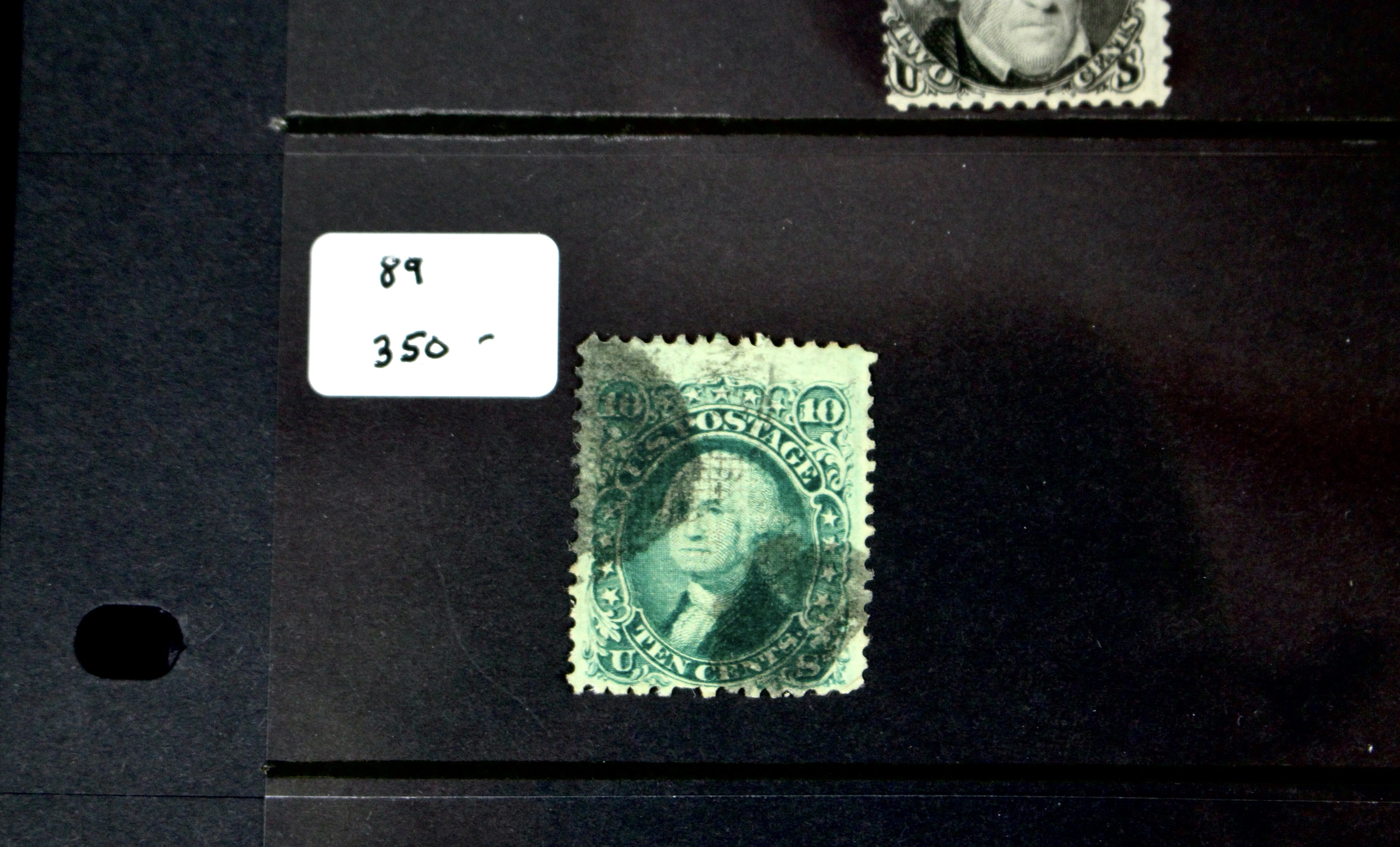 Seven Early U.S. Postage Stamps, All with Grills