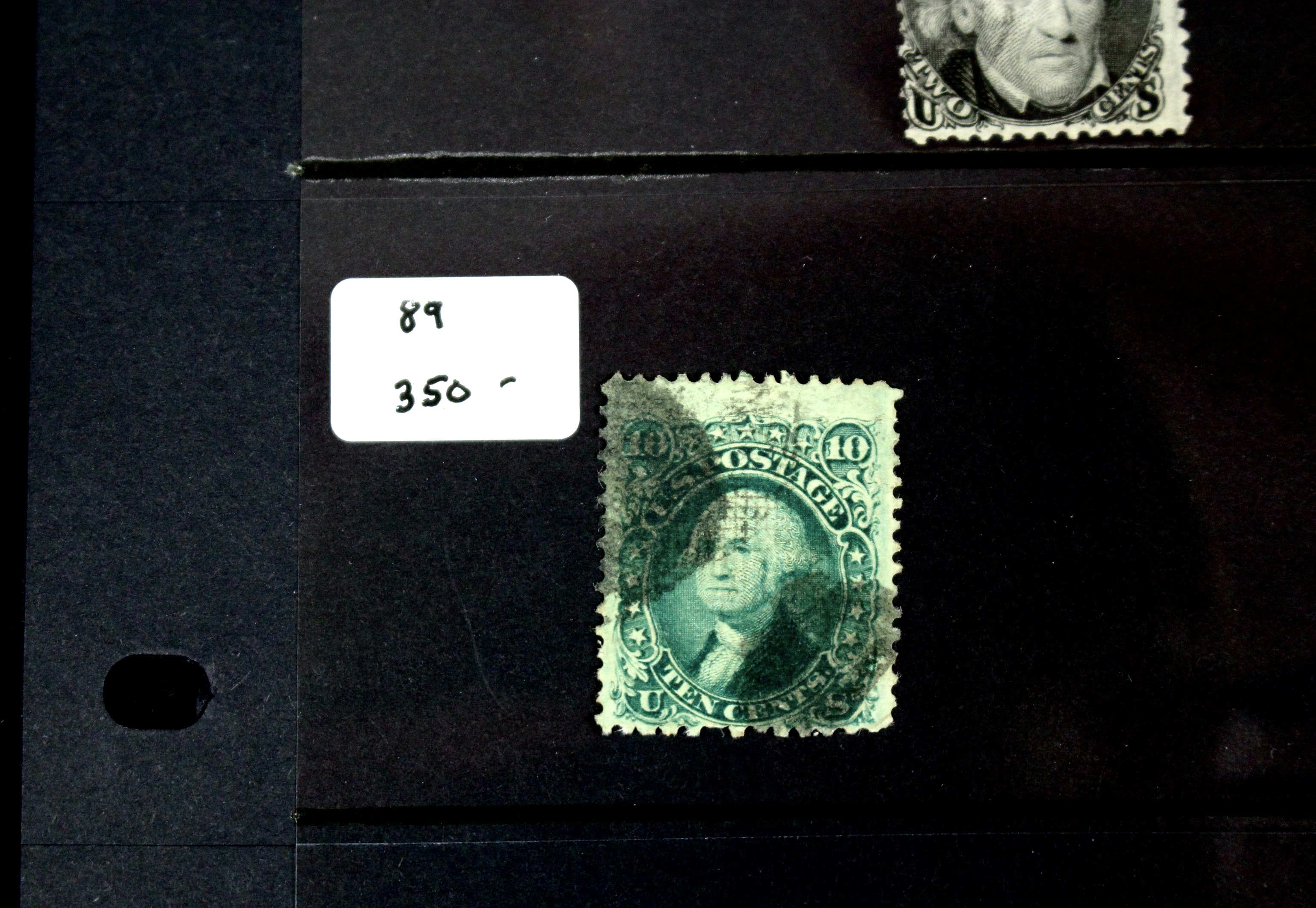 Seven Early U.S. Postage Stamps, All with Grills