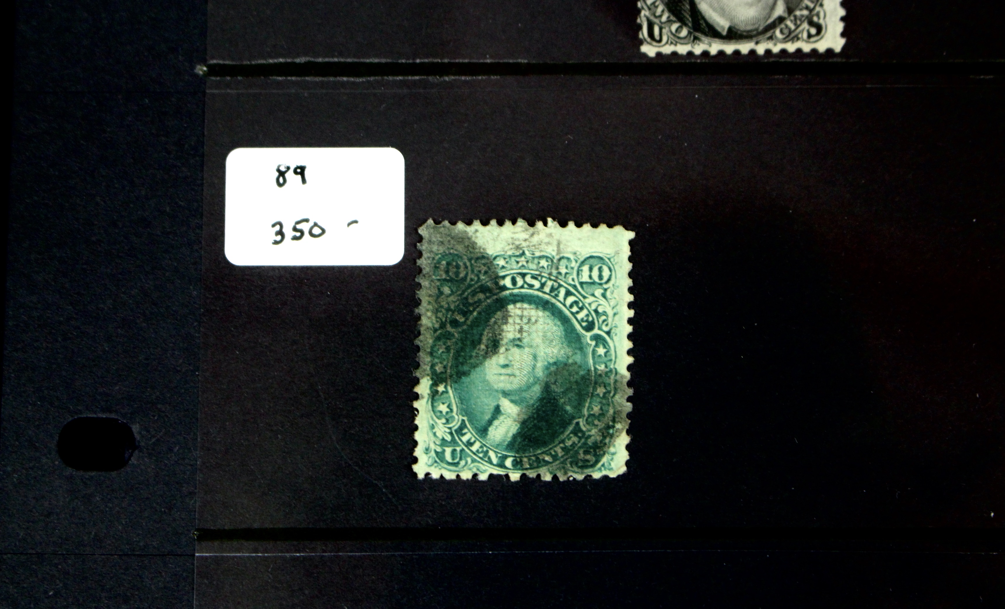 Seven Early U.S. Postage Stamps, All with Grills