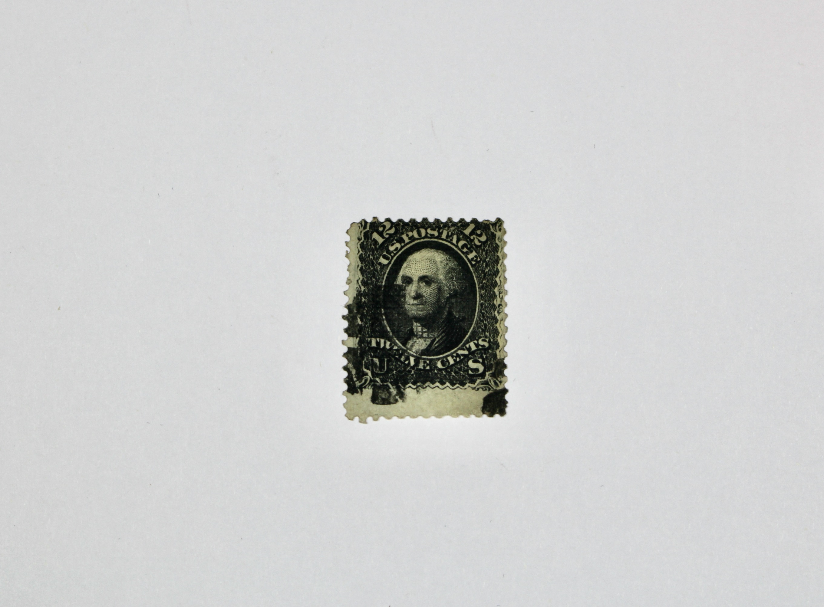 Seven Early U.S. Postage Stamps, All with Grills