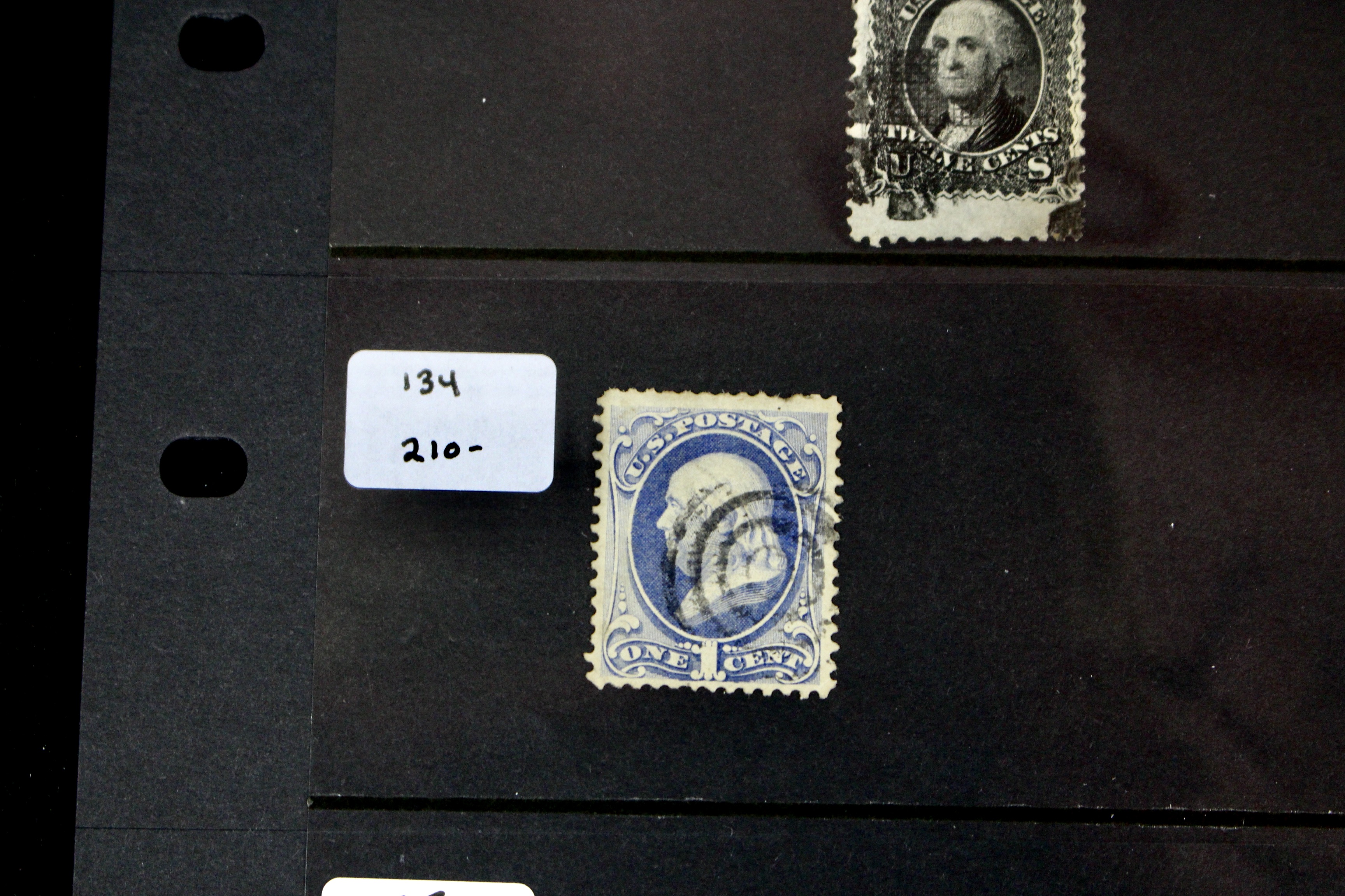 Seven Early U.S. Postage Stamps, All with Grills