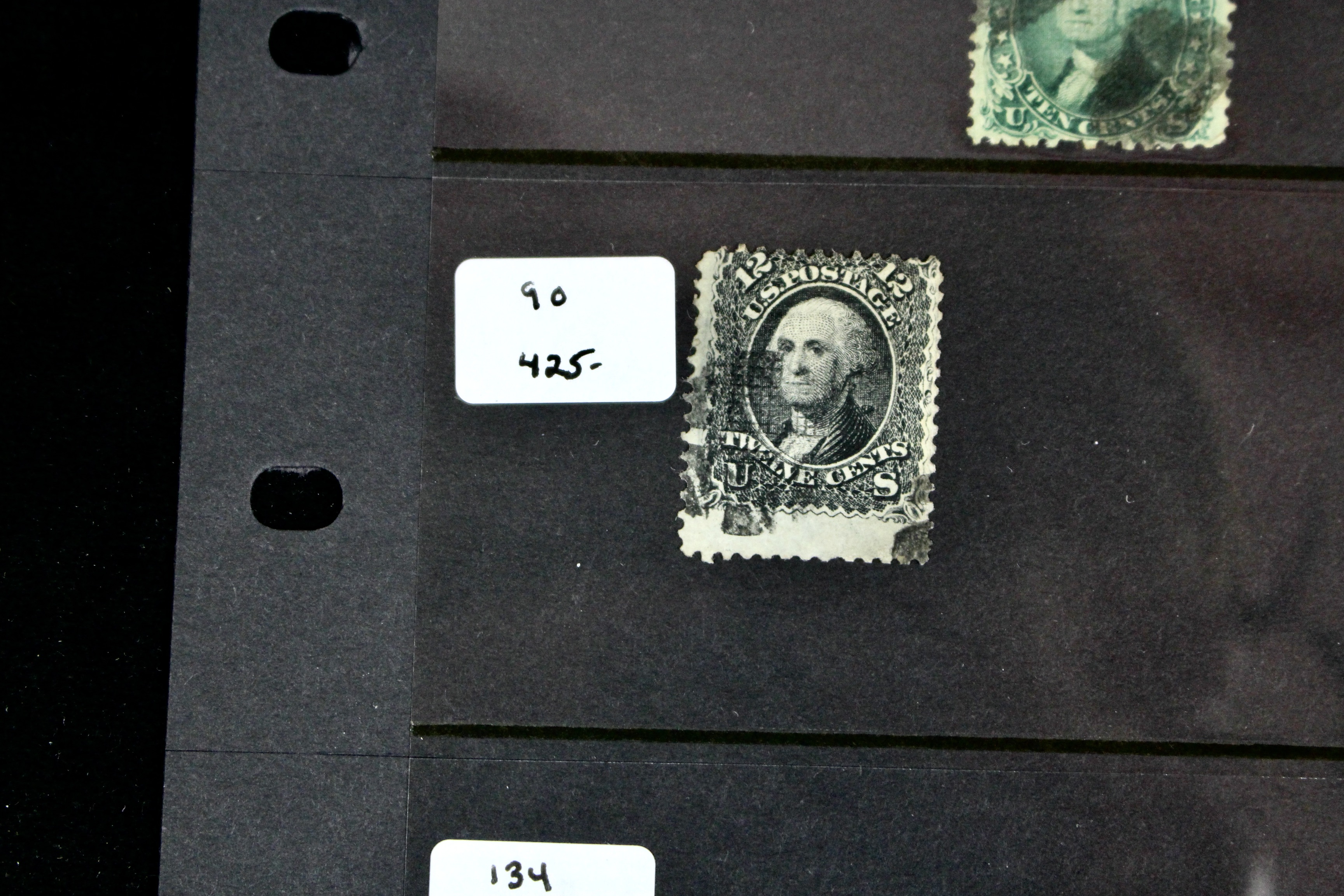Seven Early U.S. Postage Stamps, All with Grills