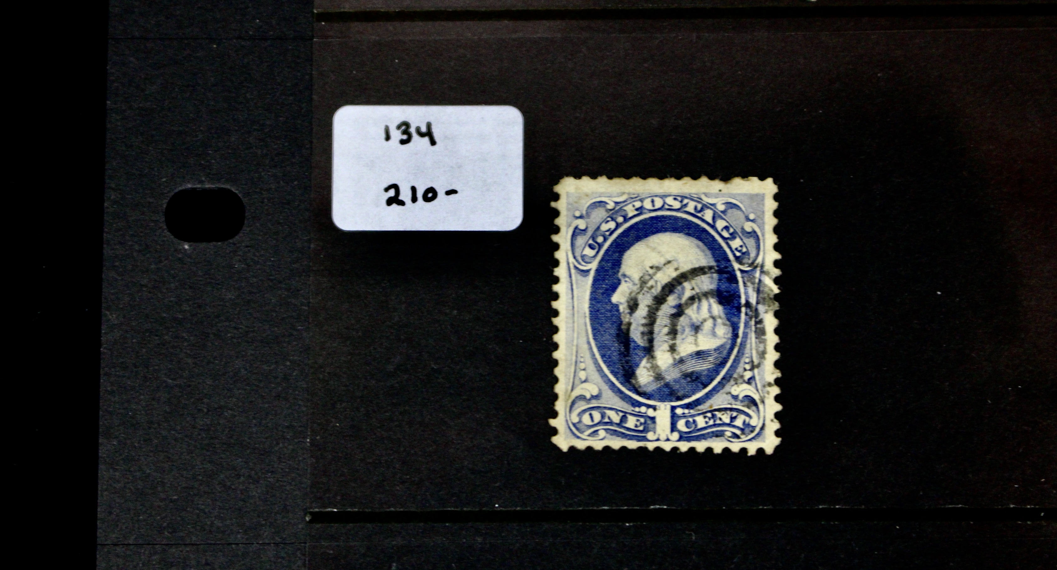 Seven Early U.S. Postage Stamps, All with Grills