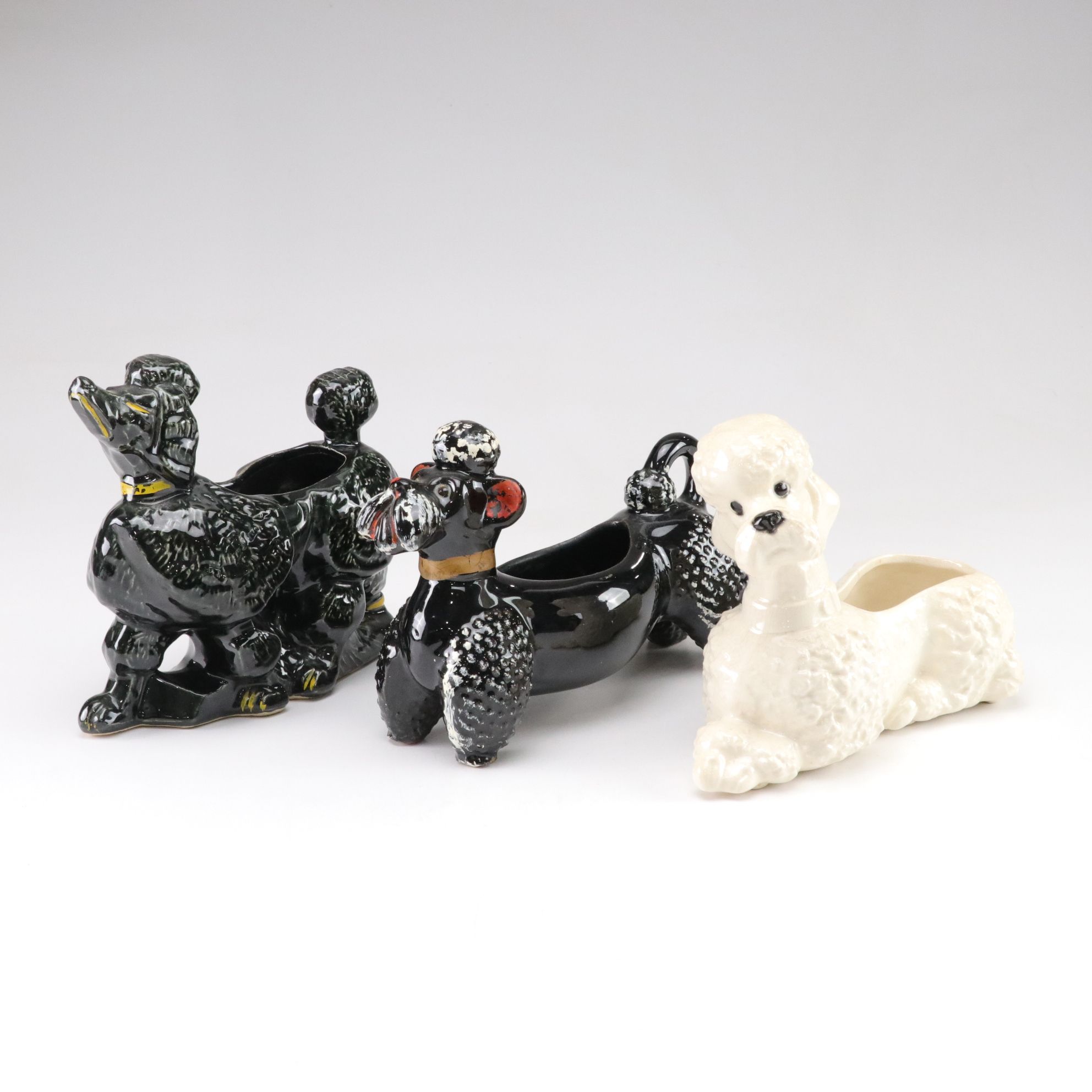 McCoy and Other Ceramic Poodle Planters, Mid-20th Century