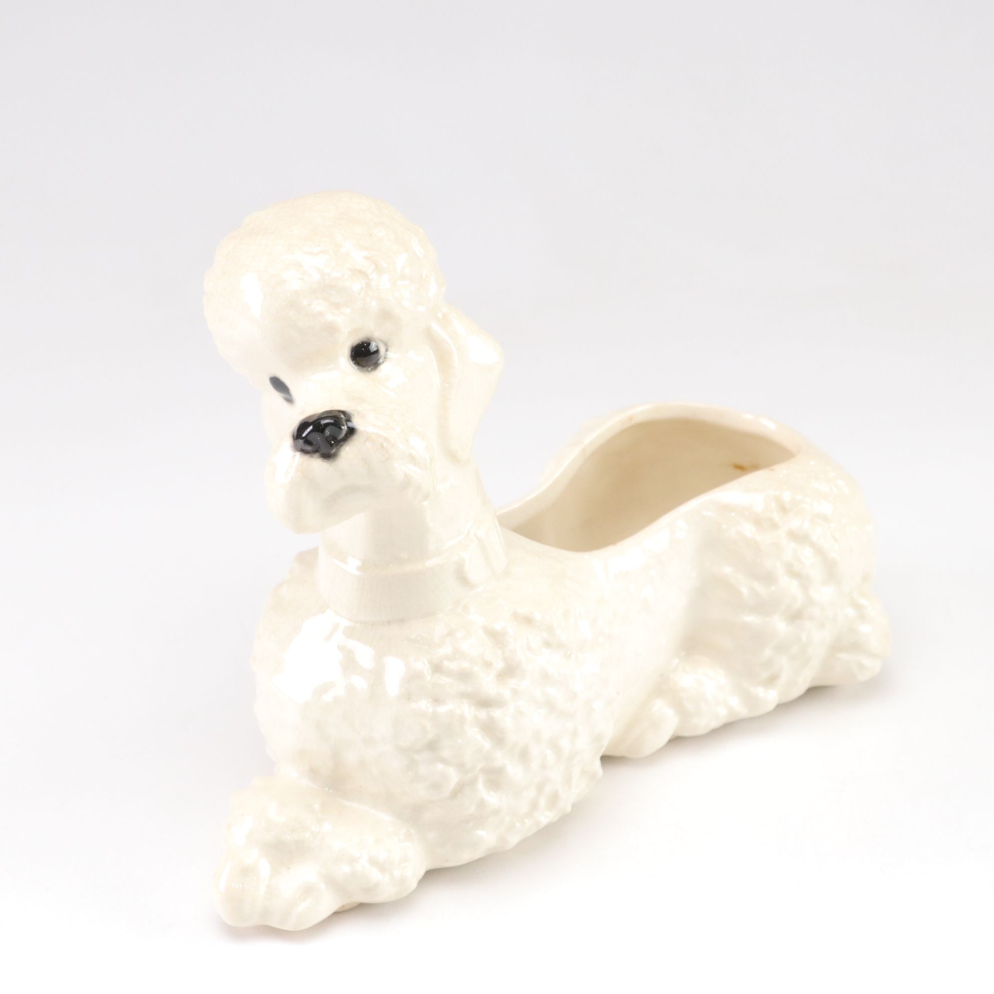 McCoy and Other Ceramic Poodle Planters, Mid-20th Century