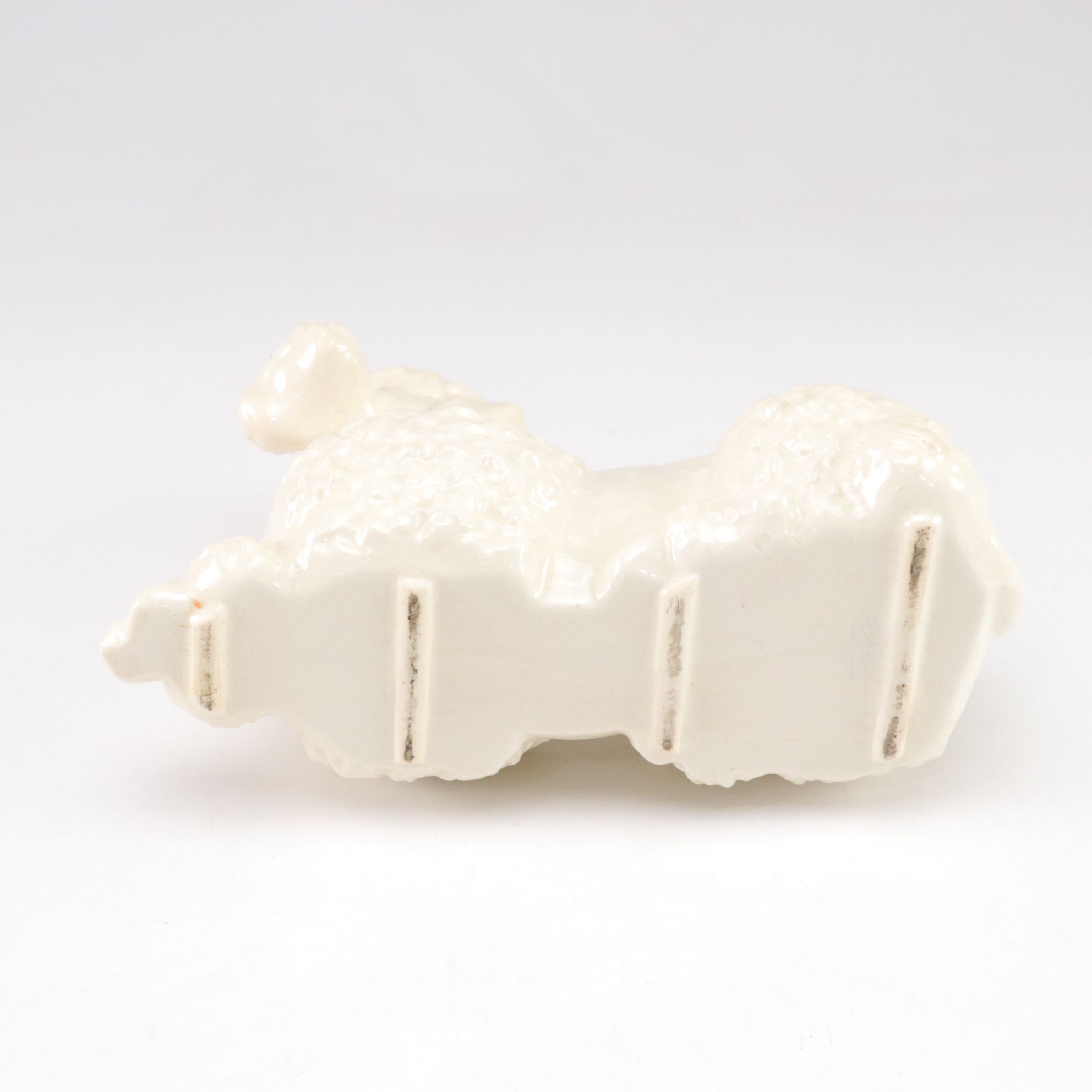 McCoy and Other Ceramic Poodle Planters, Mid-20th Century