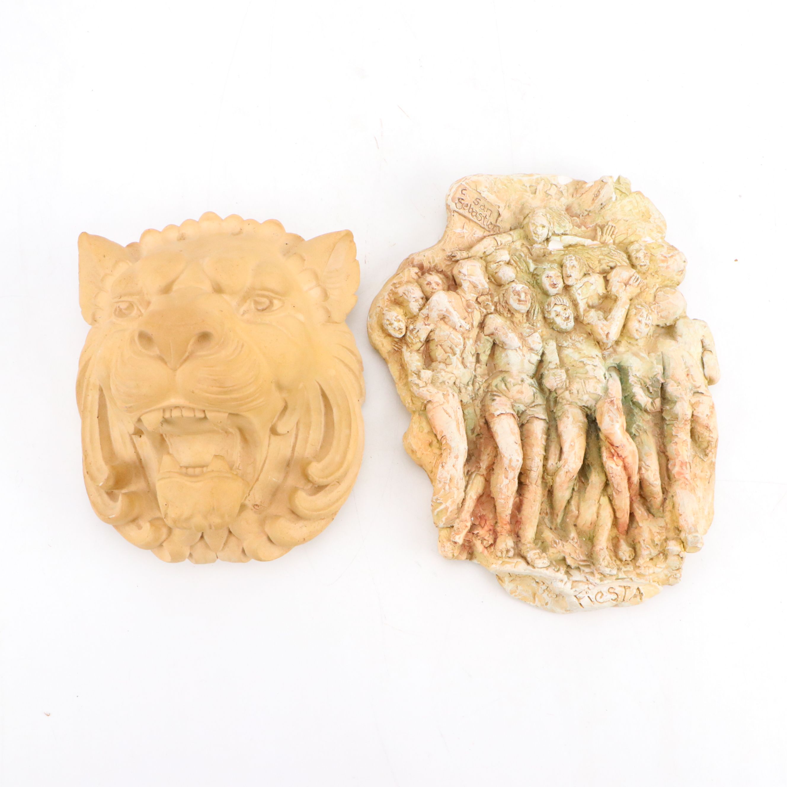 Plaster San Sebastian and Lion's Head Wall Reliefs