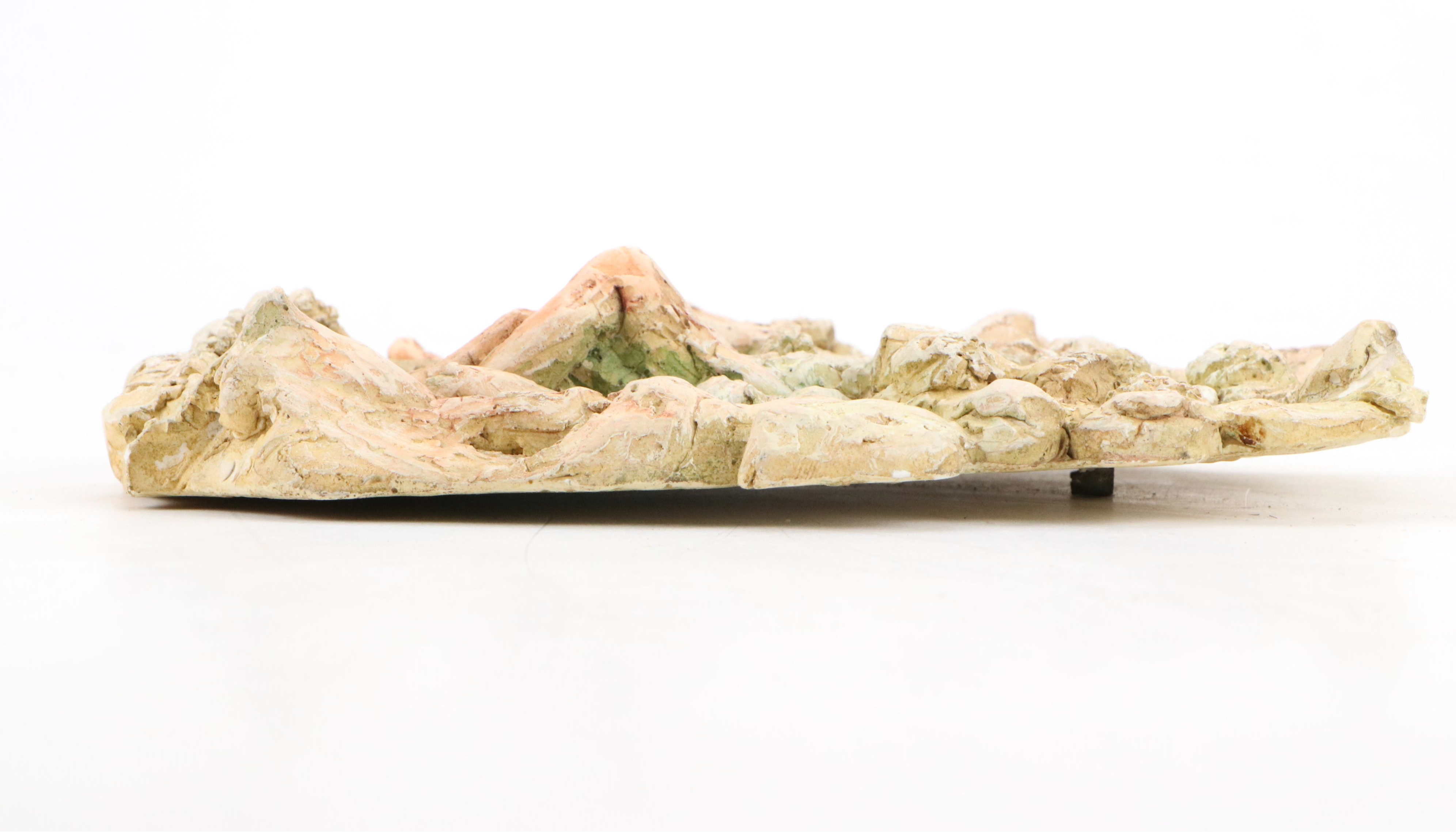 Plaster San Sebastian and Lion's Head Wall Reliefs