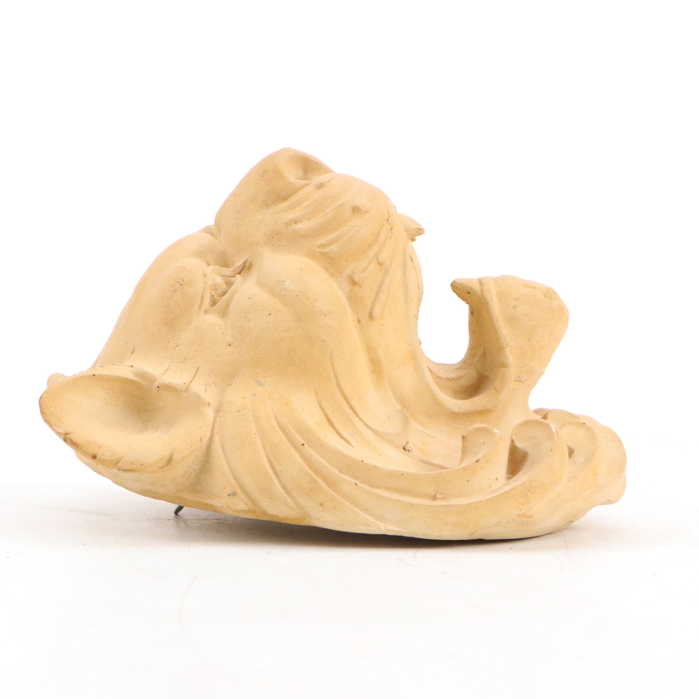 Plaster San Sebastian and Lion's Head Wall Reliefs