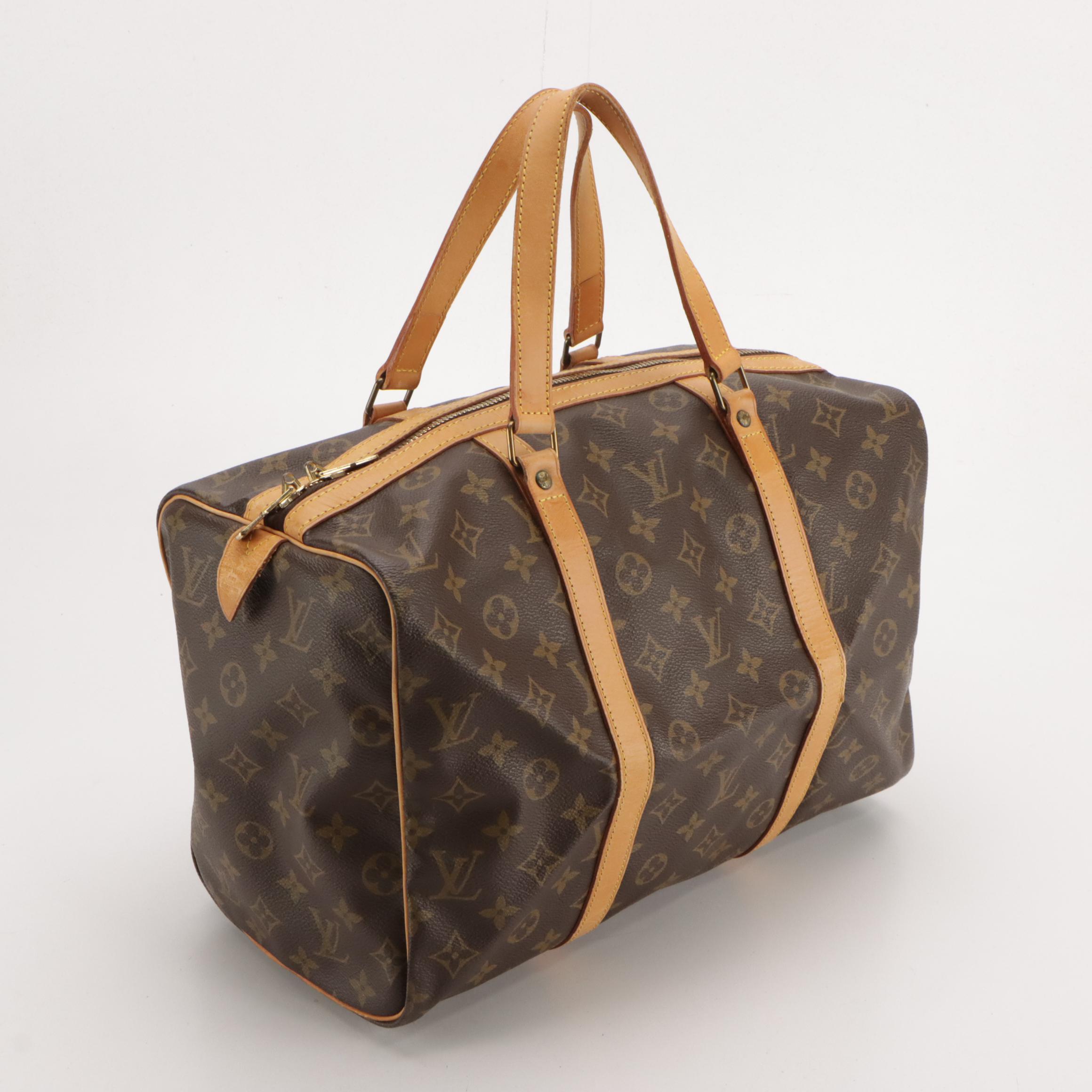 Louis Vuitton Sac Souple 35 Handbag in Monogram Canvas and Vachetta Leather