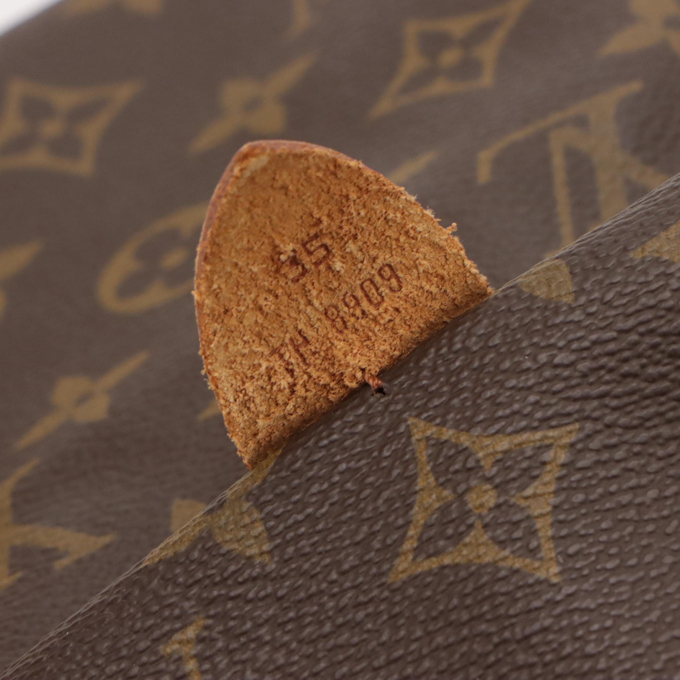 Louis Vuitton Sac Souple 35 Handbag in Monogram Canvas and Vachetta Leather