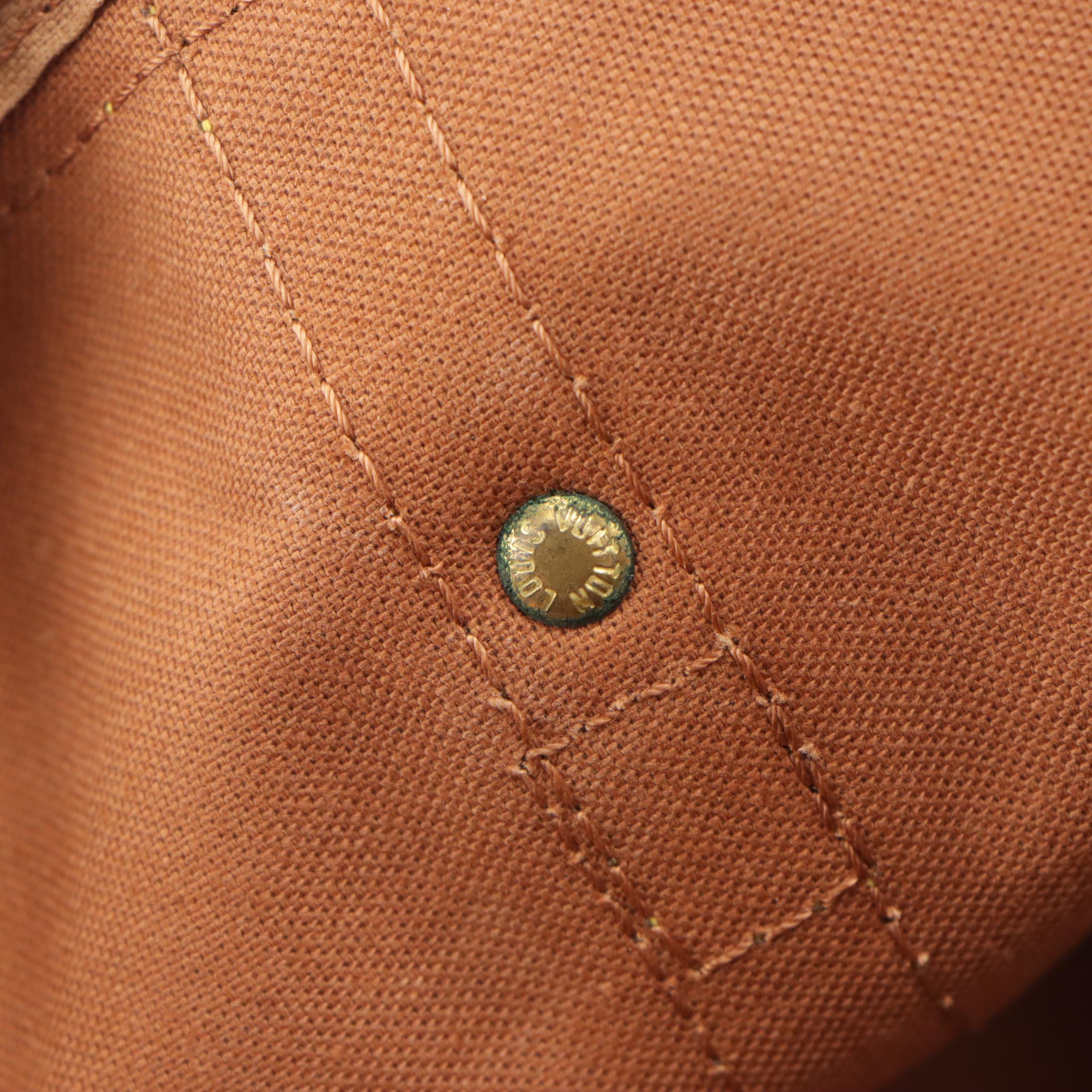 Louis Vuitton Sac Souple 35 Handbag in Monogram Canvas and Vachetta Leather