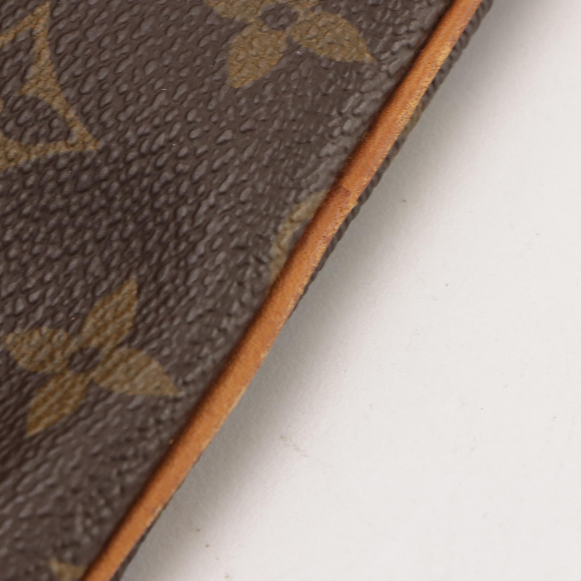 Louis Vuitton Sac Souple 35 Handbag in Monogram Canvas and Vachetta Leather