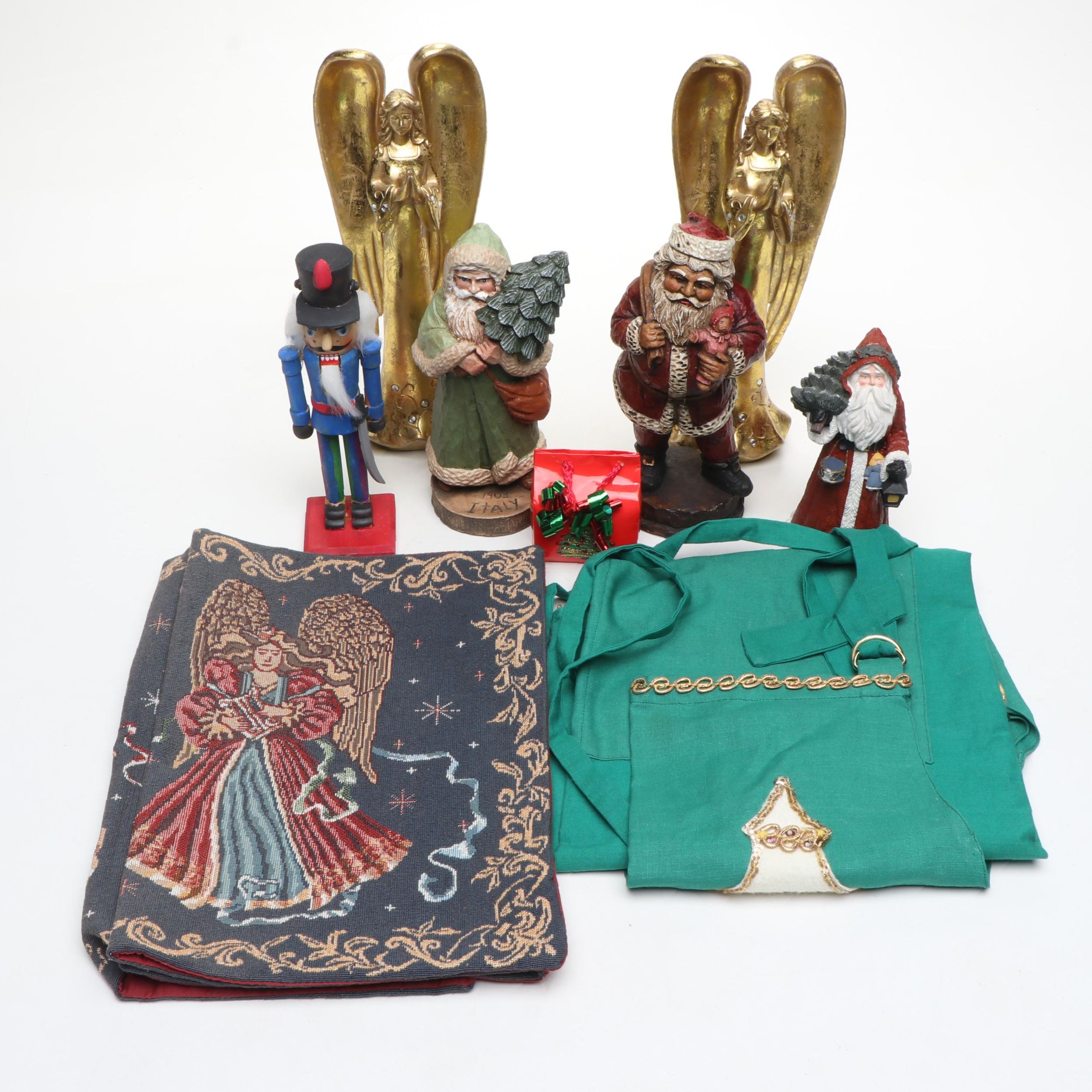 Wooden Santa with Other Figurines, Apron, Tapestry and Music Box