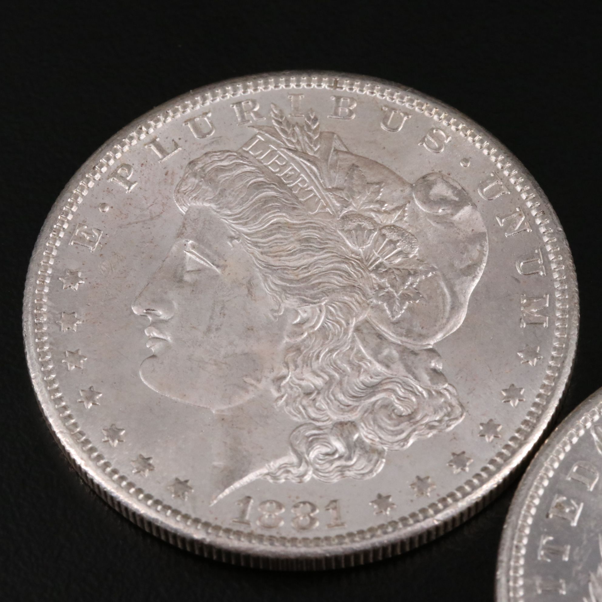 Two 1881-S Morgan Silver Dollars