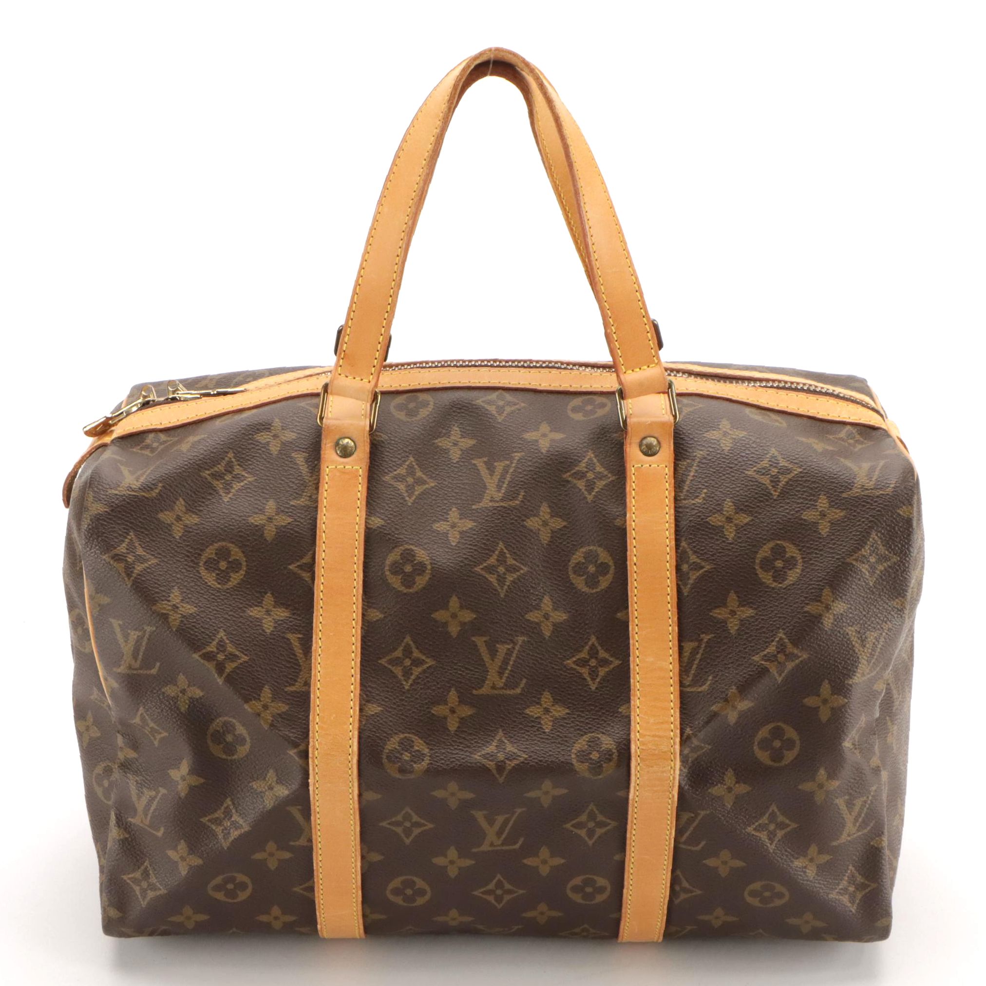 Louis Vuitton Sac Souple 35 Handbag in Monogram Canvas and Vachetta Leather