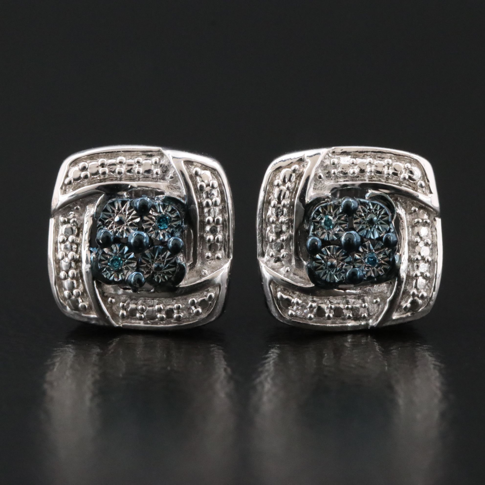 Sterling Diamond Earrings Featuring Fancy Blue