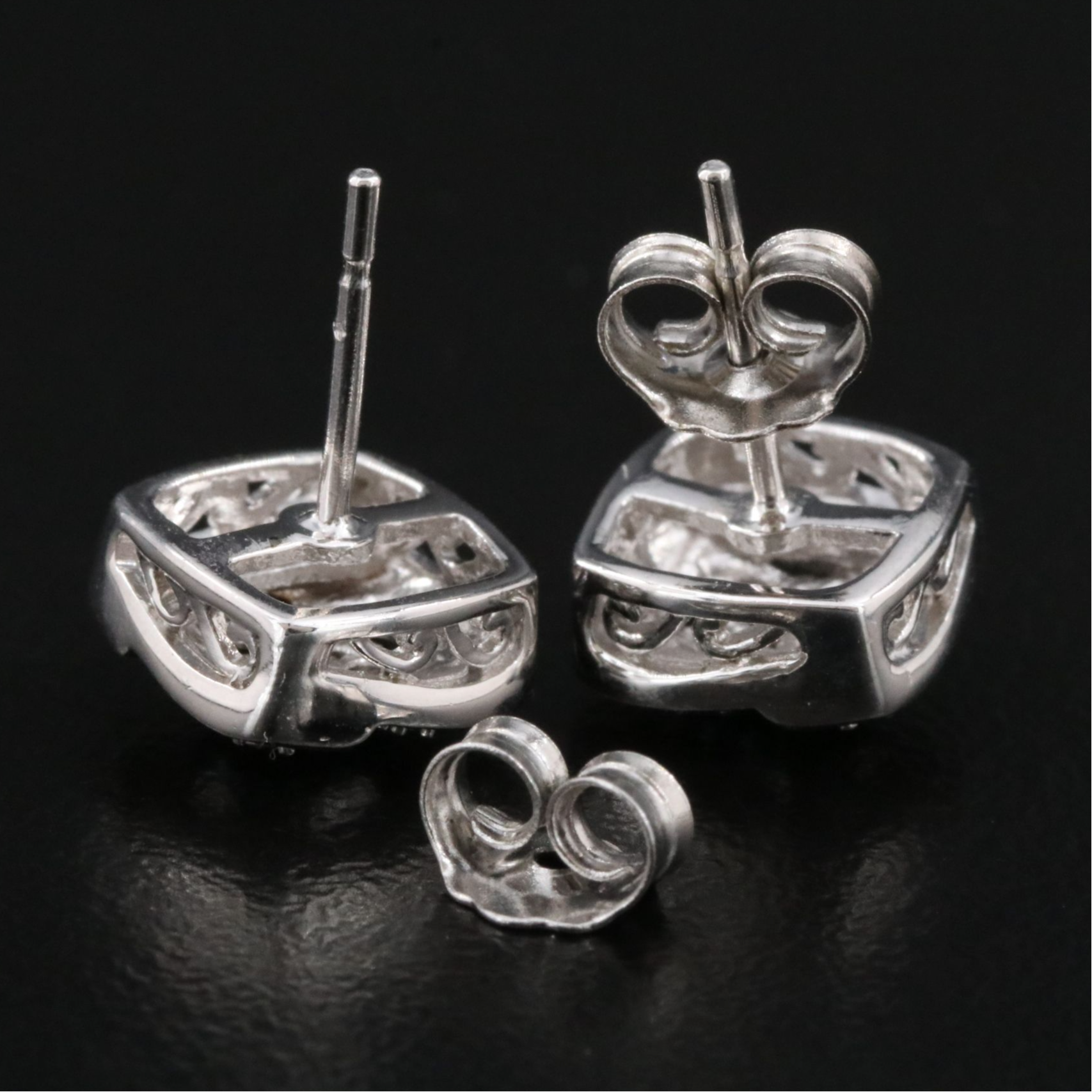 Sterling Diamond Earrings Featuring Fancy Blue