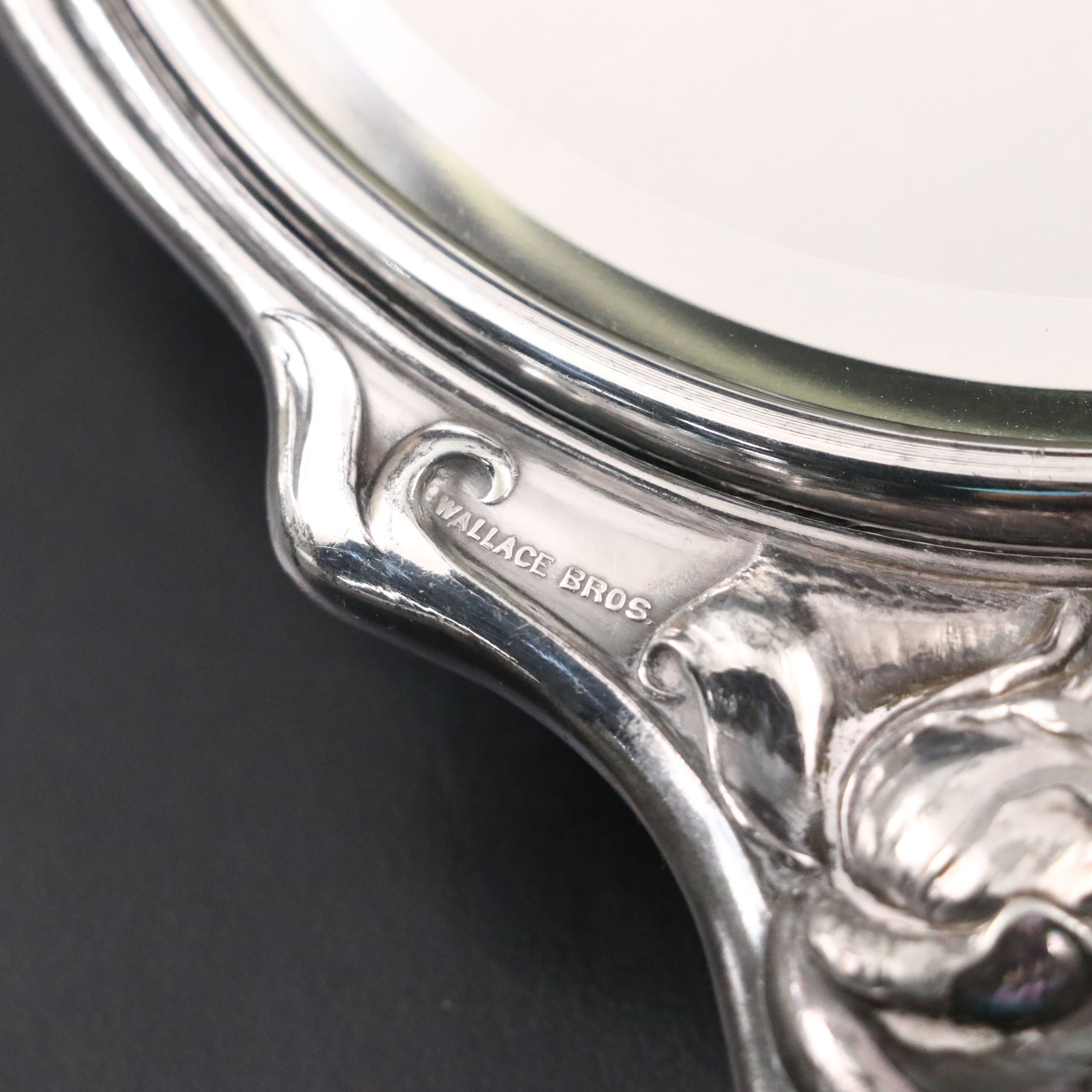 Wallace Bros. Repoussé Silver Plate Hand Mirror