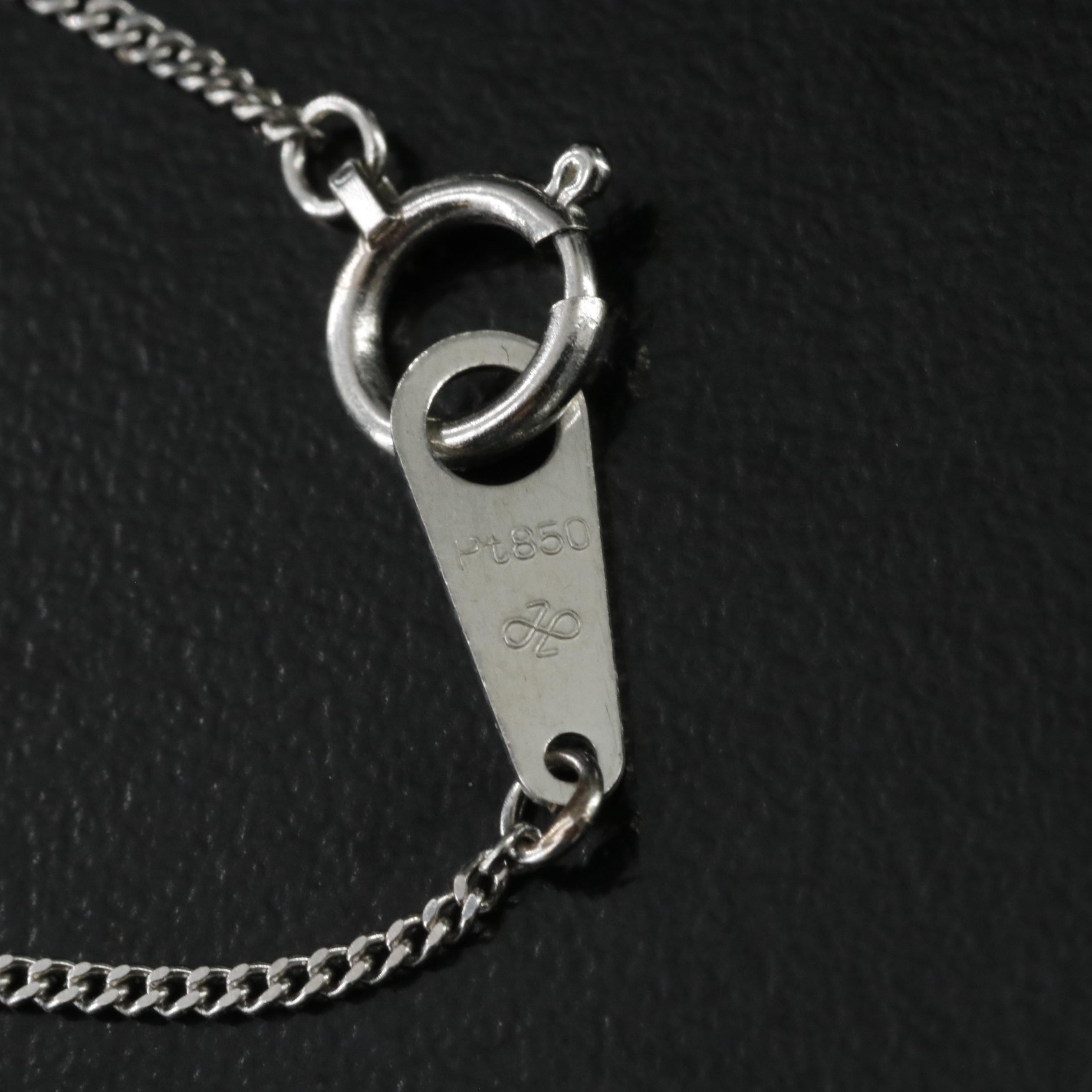 Platinum Sapphire and Diamond Halo Necklace