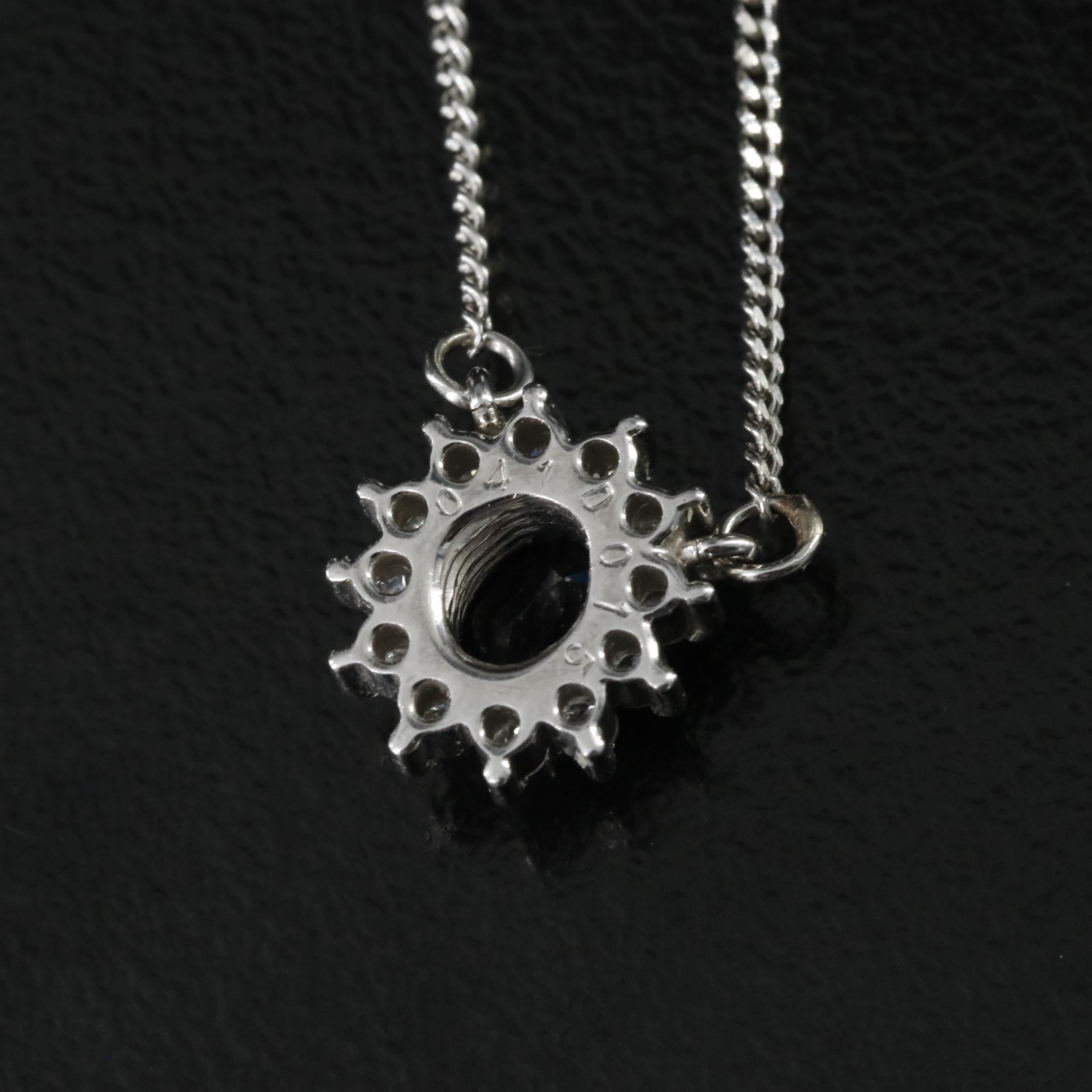 Platinum Sapphire and Diamond Halo Necklace