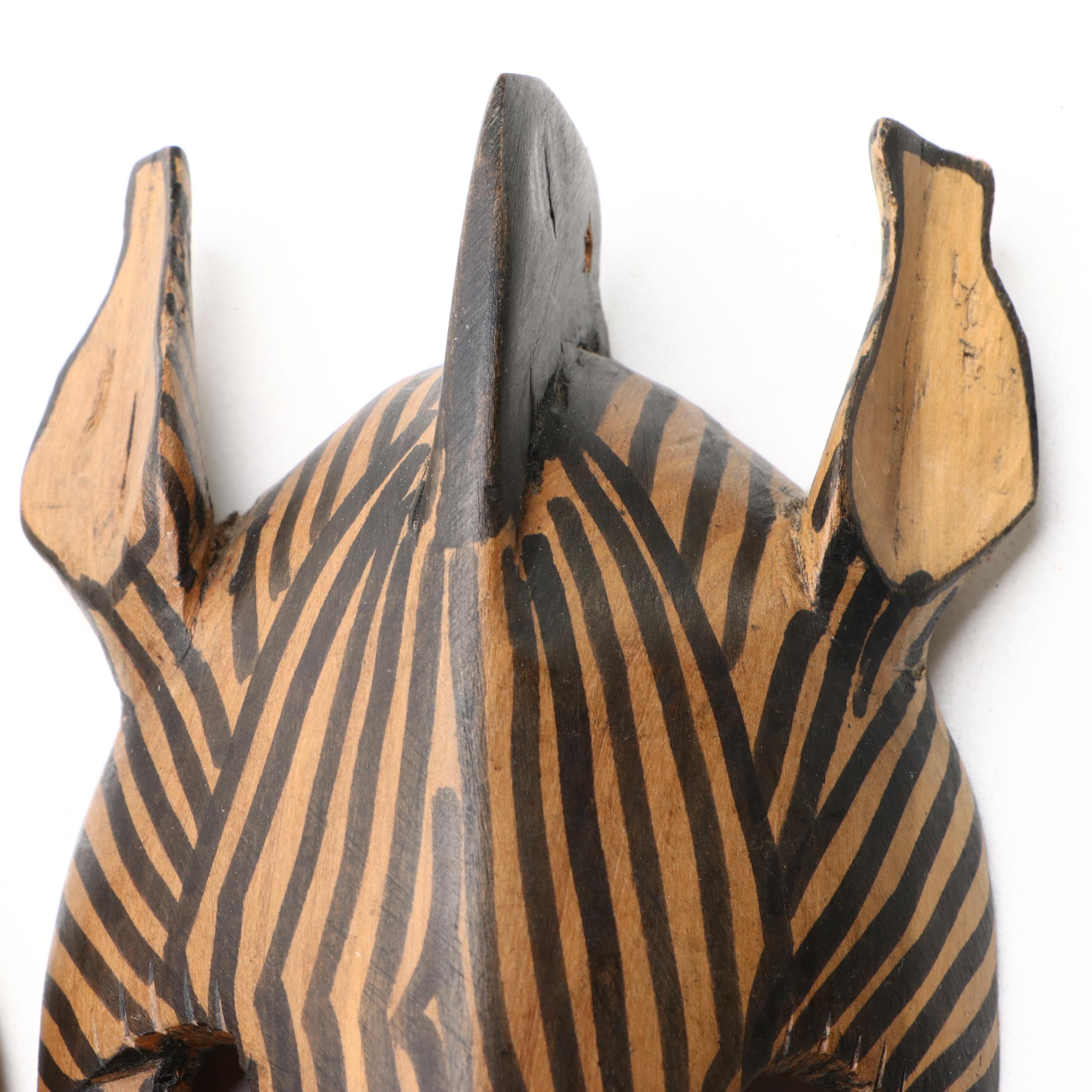 African Hand-Carved Wood Giraffe and Zebra Mask Wall Hanging