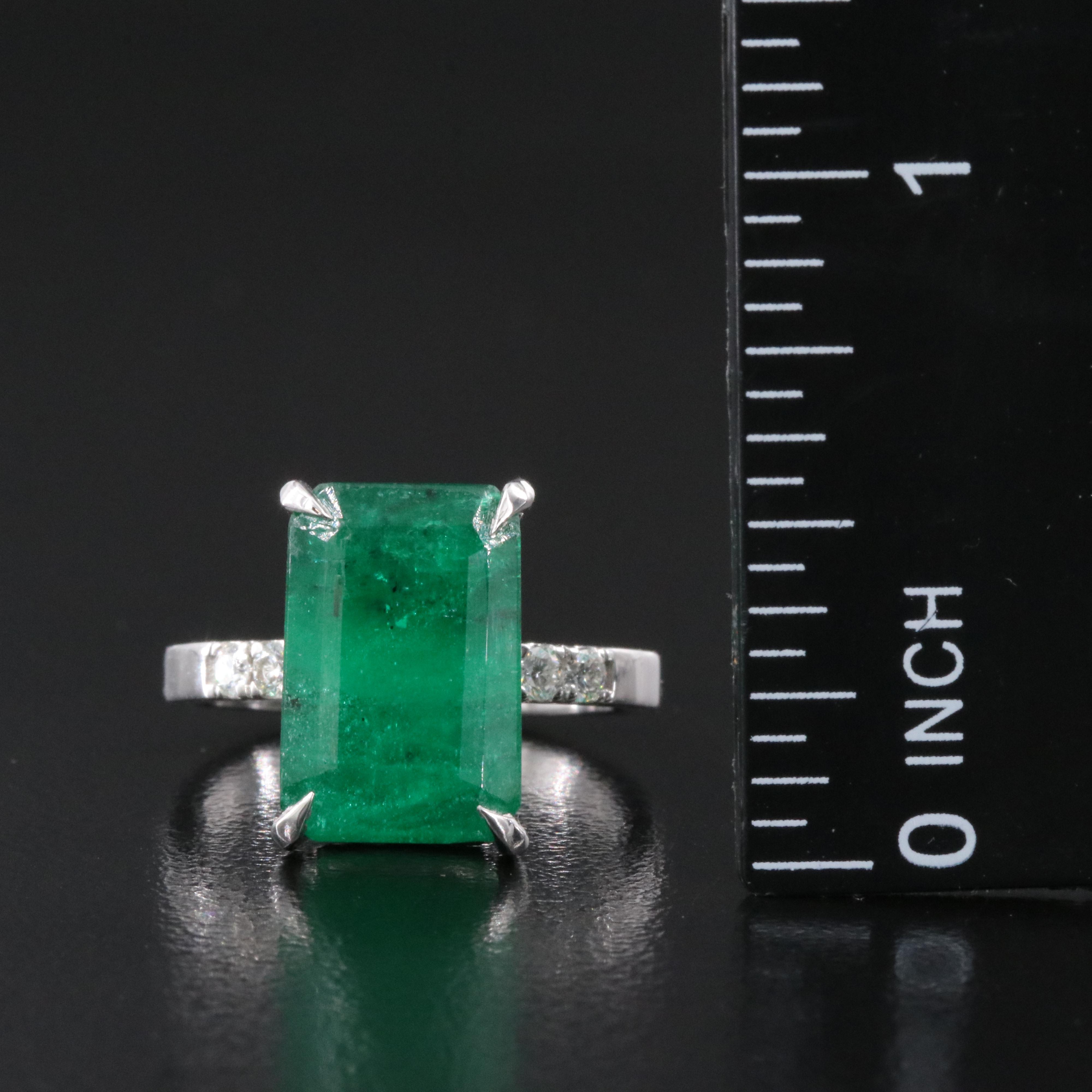 14K 6.87 CTW Emerald and Diamond Ring
