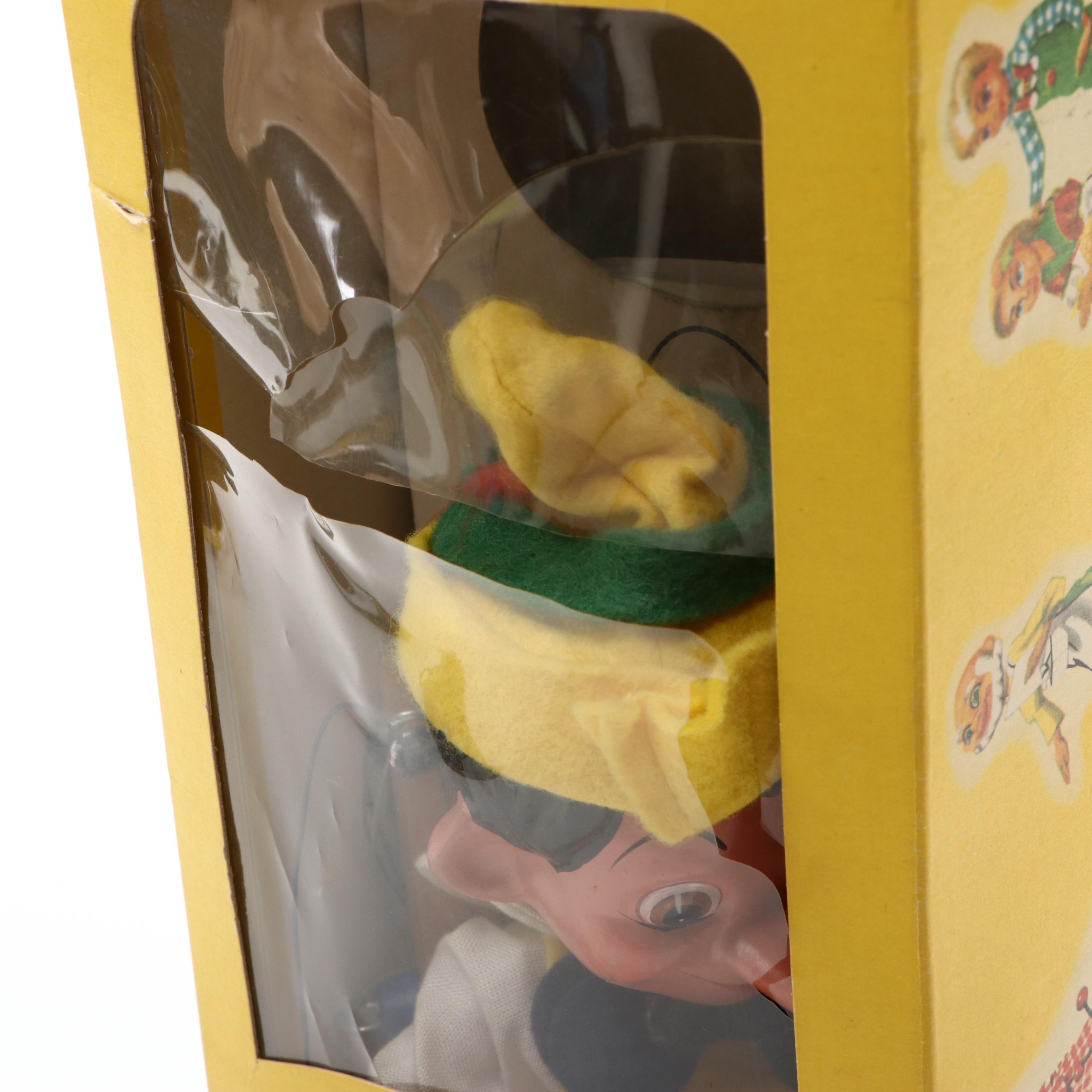 Pinocchio Puppets, Books and Wind-Up Toy, Early to Mid-20th Century